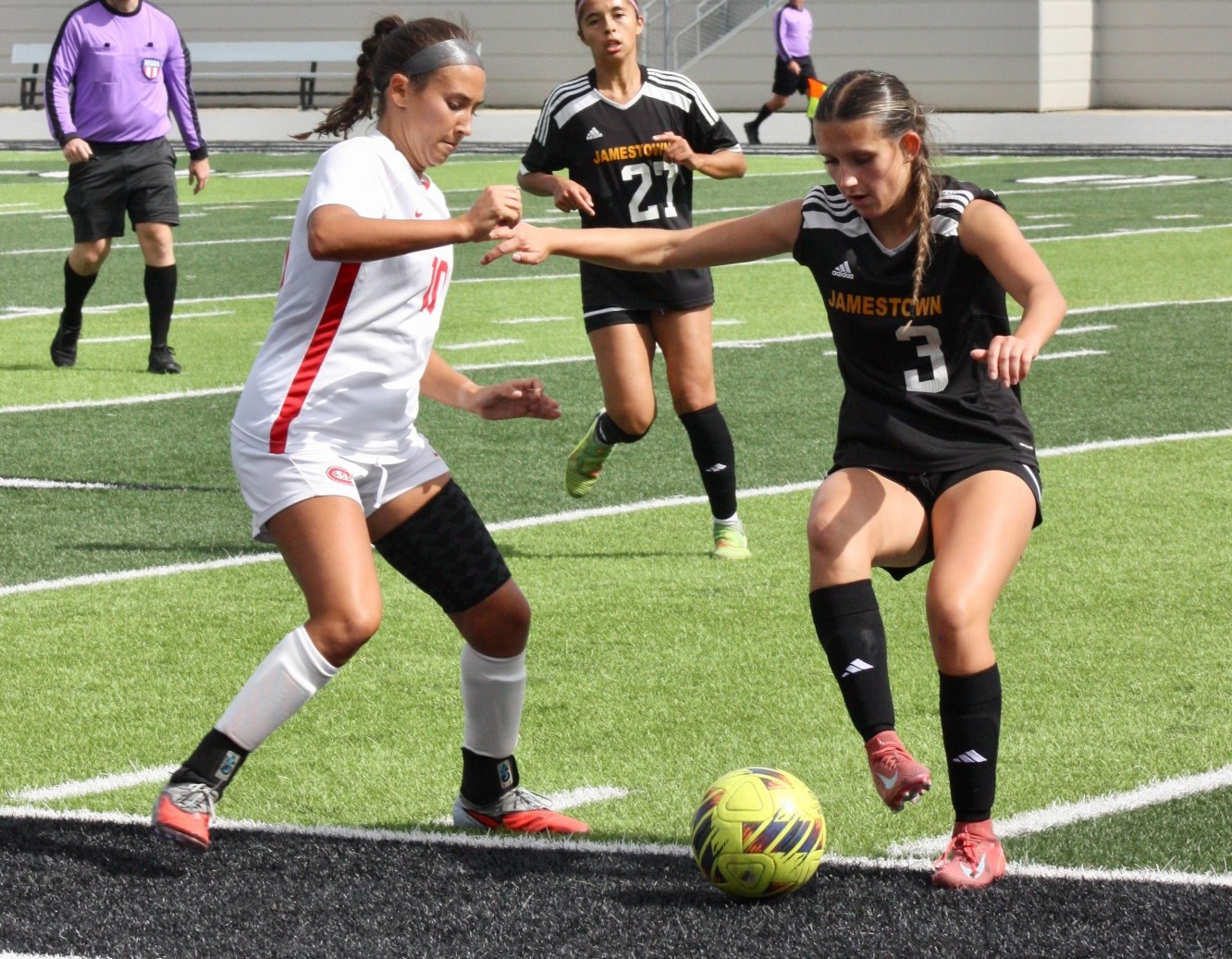 Emma Belyk battles for possession with the St. Cloud State player