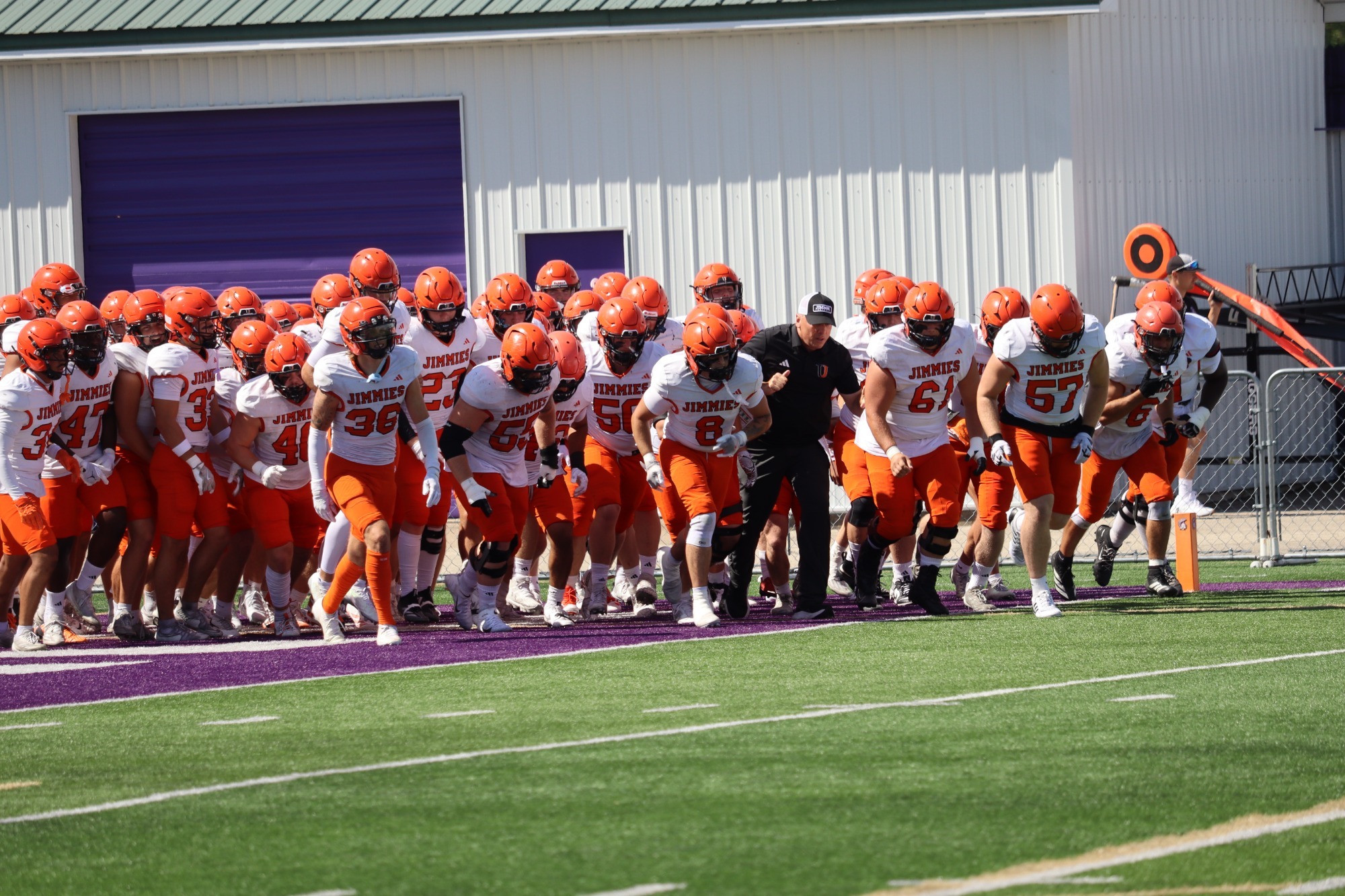 Jamestown Football Team prepares to take the field vs. Winona State 