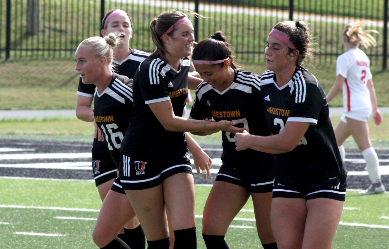 Jimmies celebrate after Julliet Lopez scores against St. Cloud State
