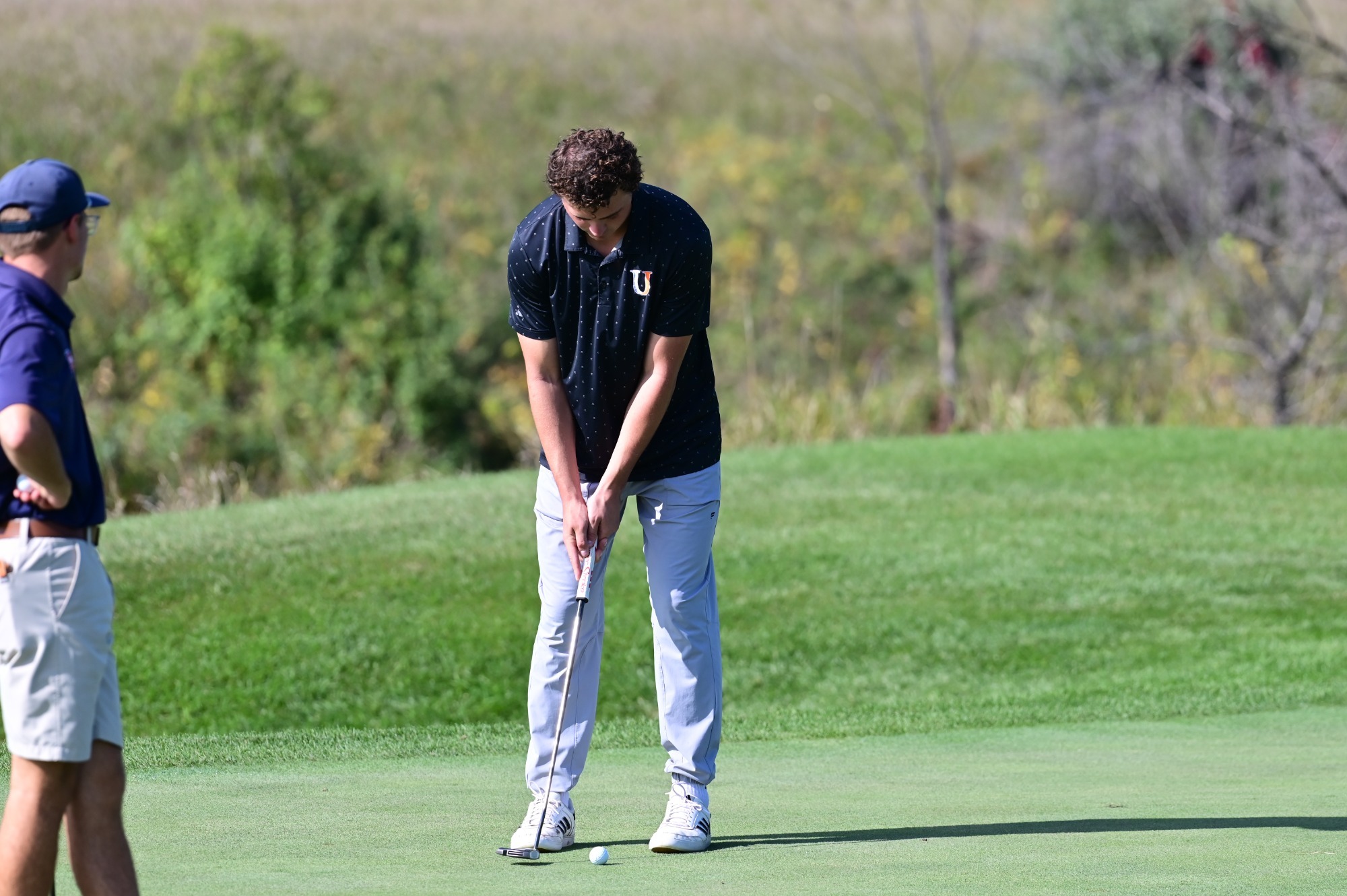 Bodie Williams lines up a putt on Tuesday, September 29 at Hawktree Golf Club