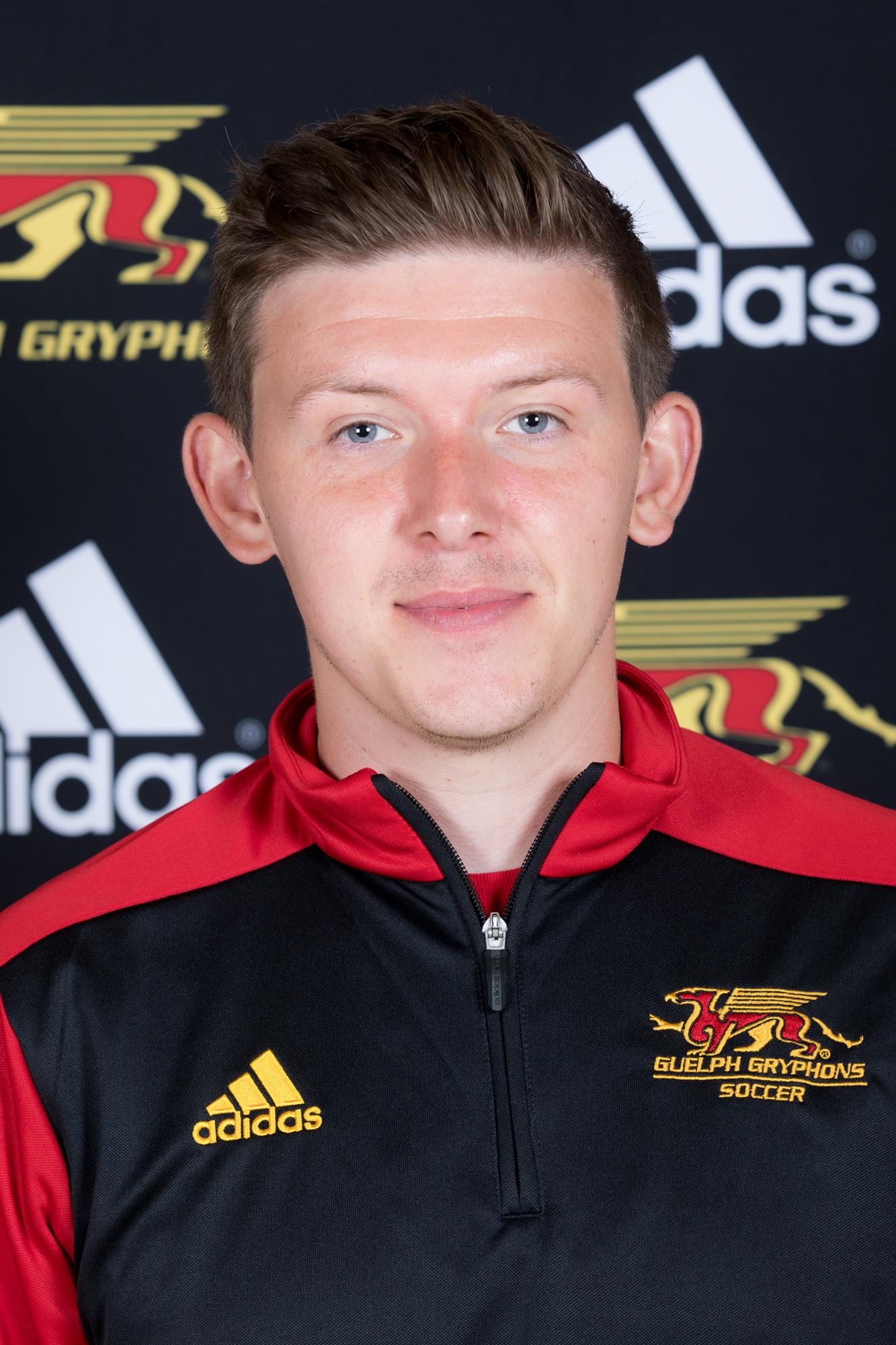 men's soccer assistant coach Sam Geveaux roster photo