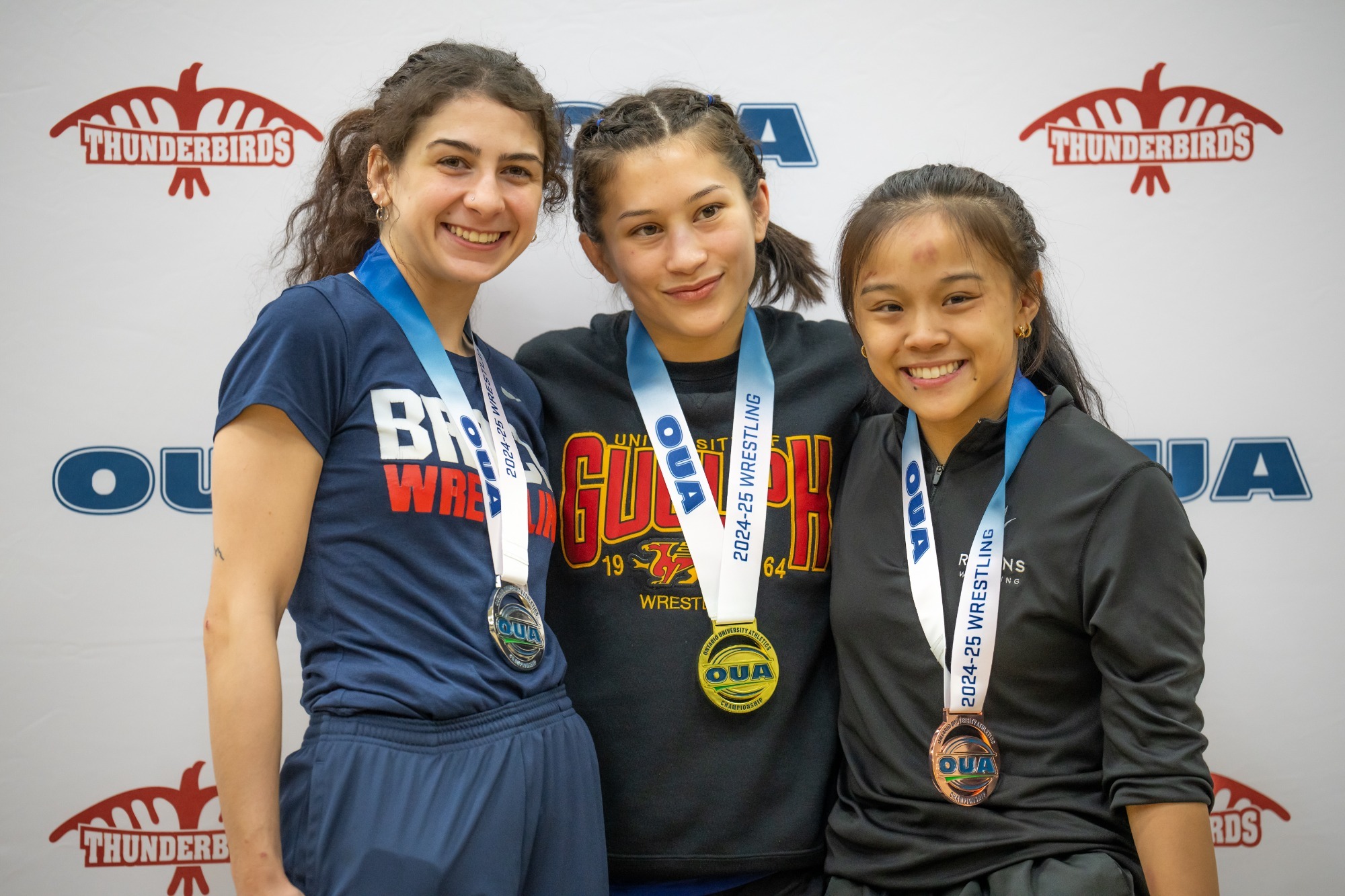 Kelyn Young poses with gold medal at 2025 OUA Wrestling Championships