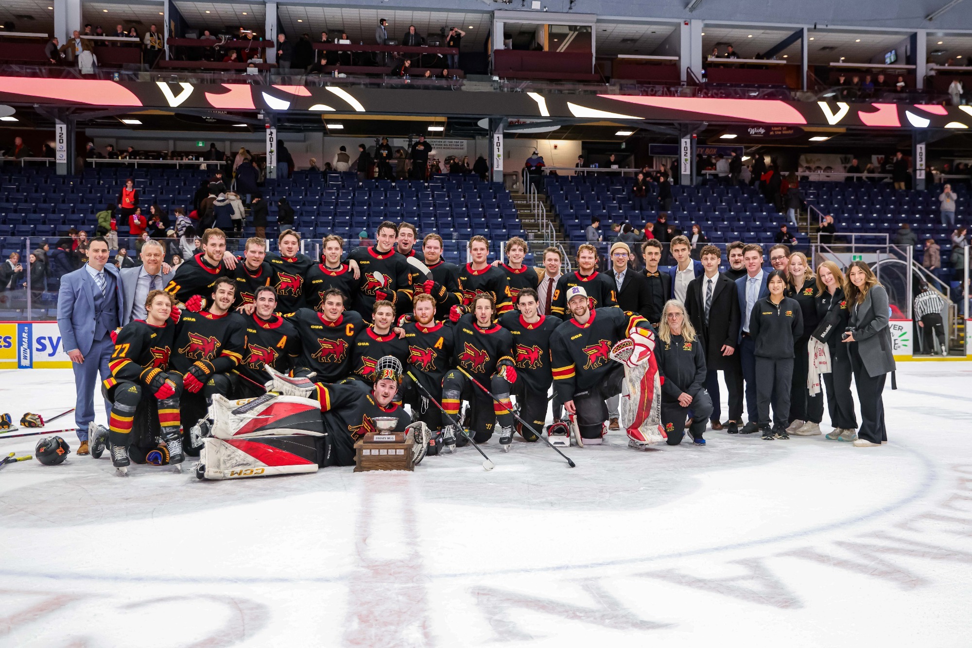 Gryphons men's hockey team with Frosty Mug trophy - Jan. 22, 2026