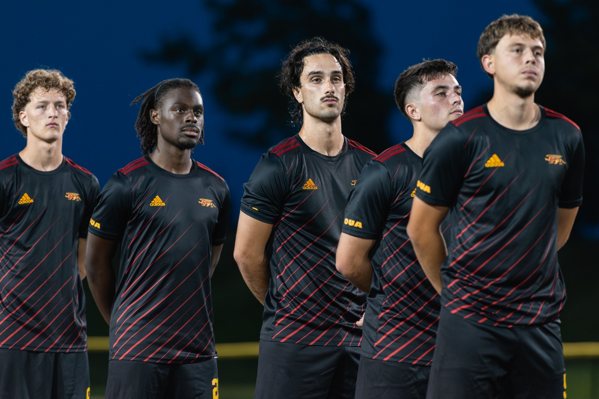 Gryphons men's soccer during anthem 