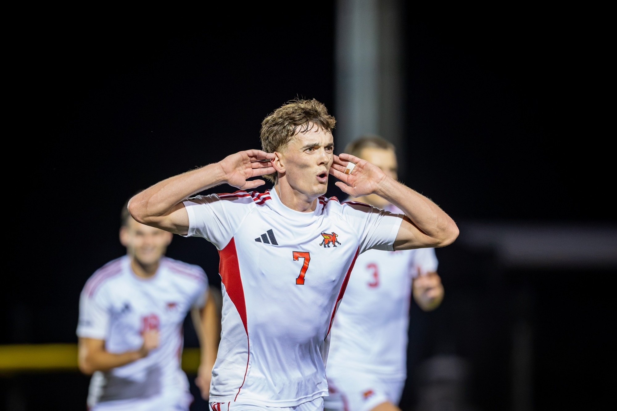 Ambrose Tinmouth celebrates vs McMaster