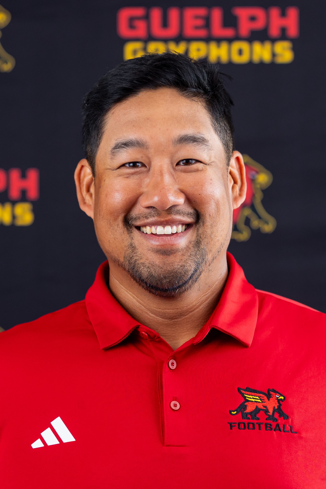 Mark Surya - head coach FB