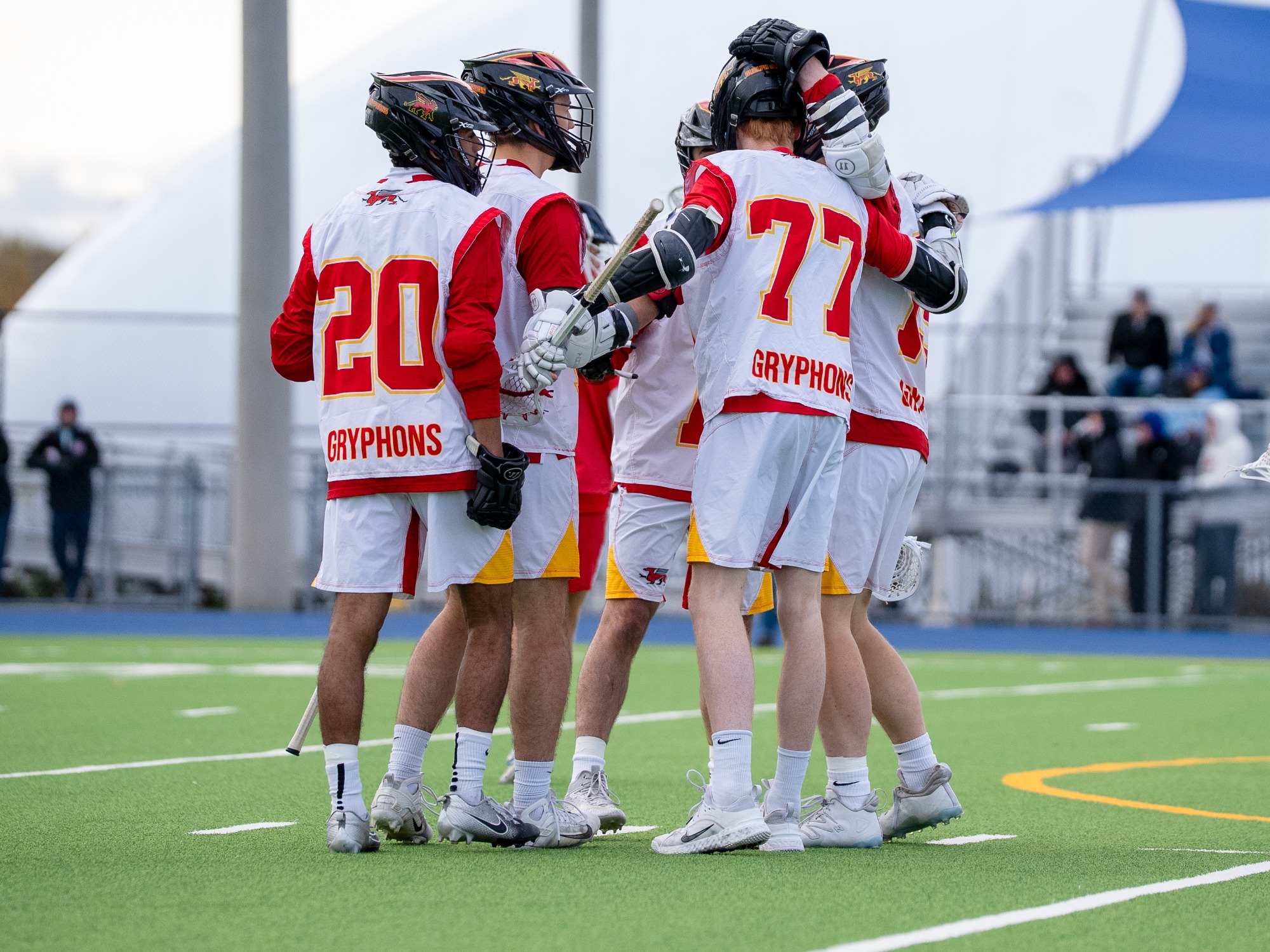 Gryphons MLAX celebrate vs Brock at Baggataway Cup