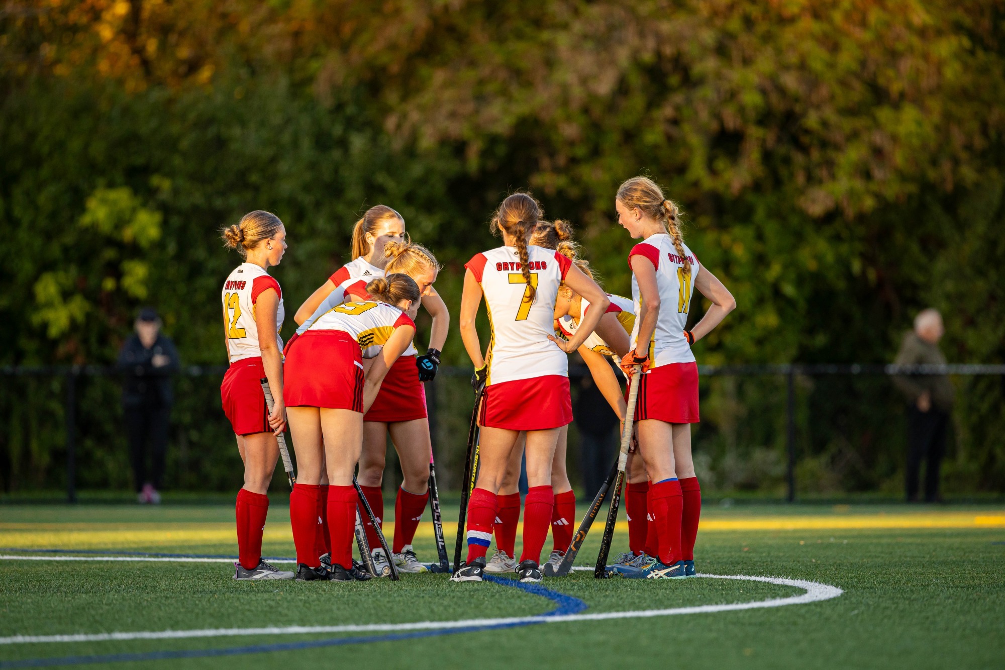 Field Hockey huddle vs Waterloo