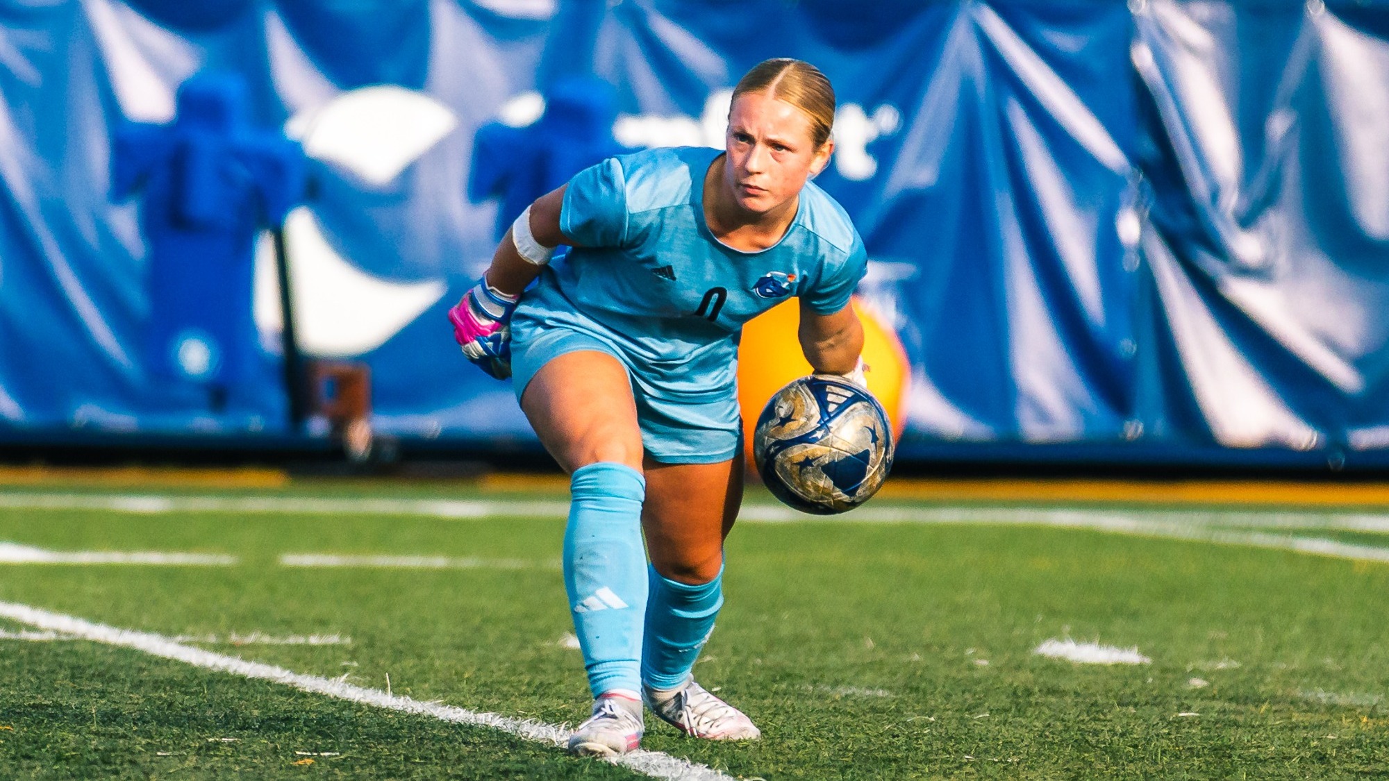 Cardy rolling the ball out of the back