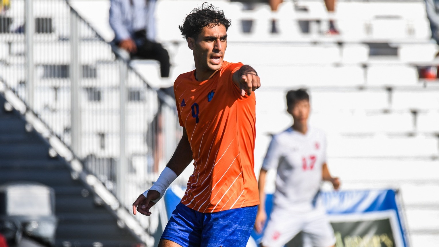 Anthony Dawoud pointing out a defender