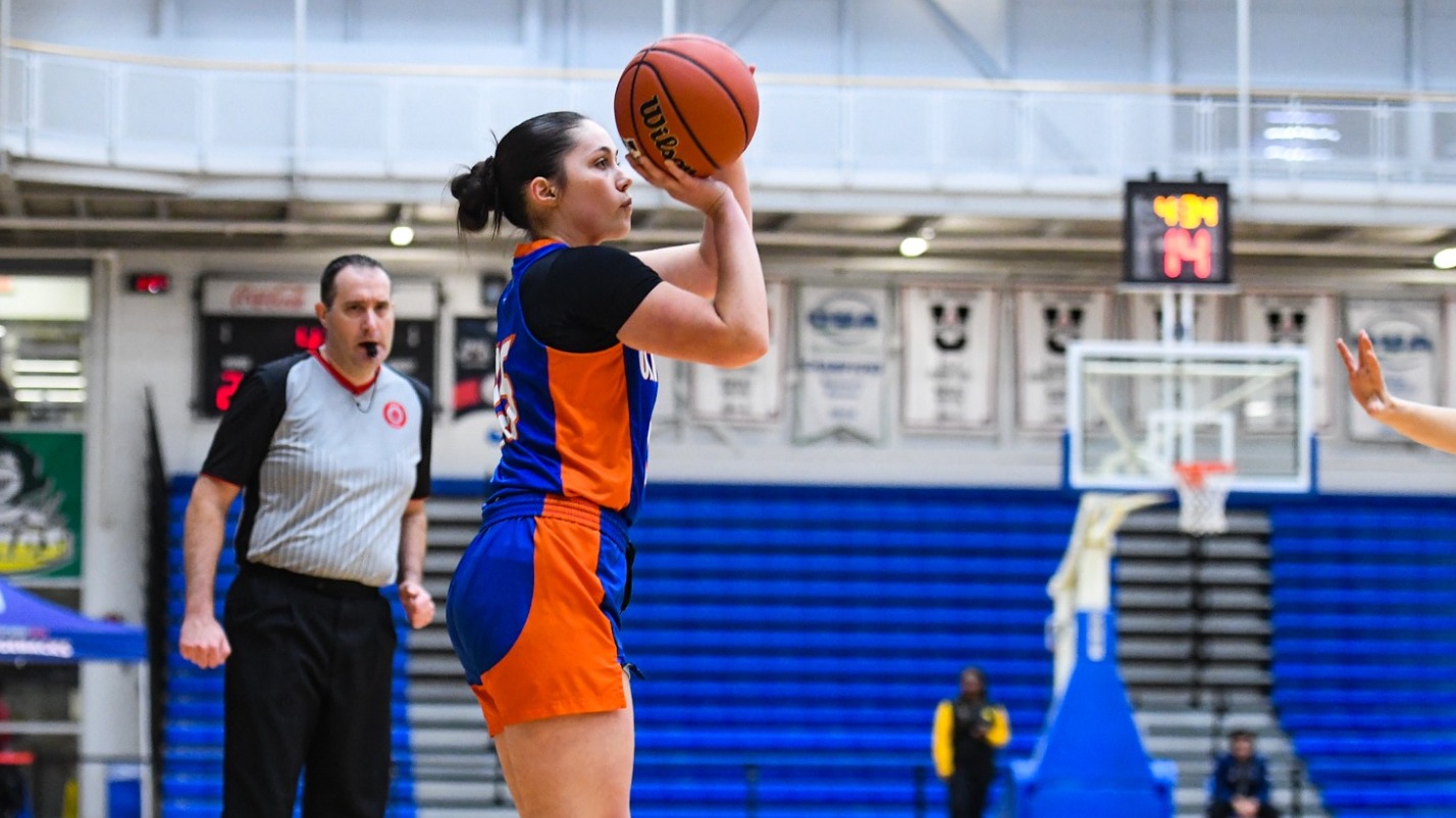 Elliot Cowan shooting a three pointer