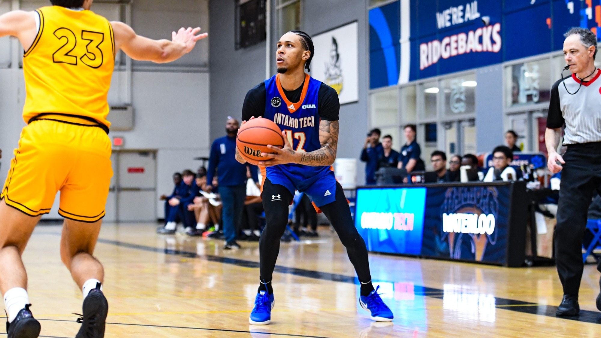 Keon Baker shooting a basketball