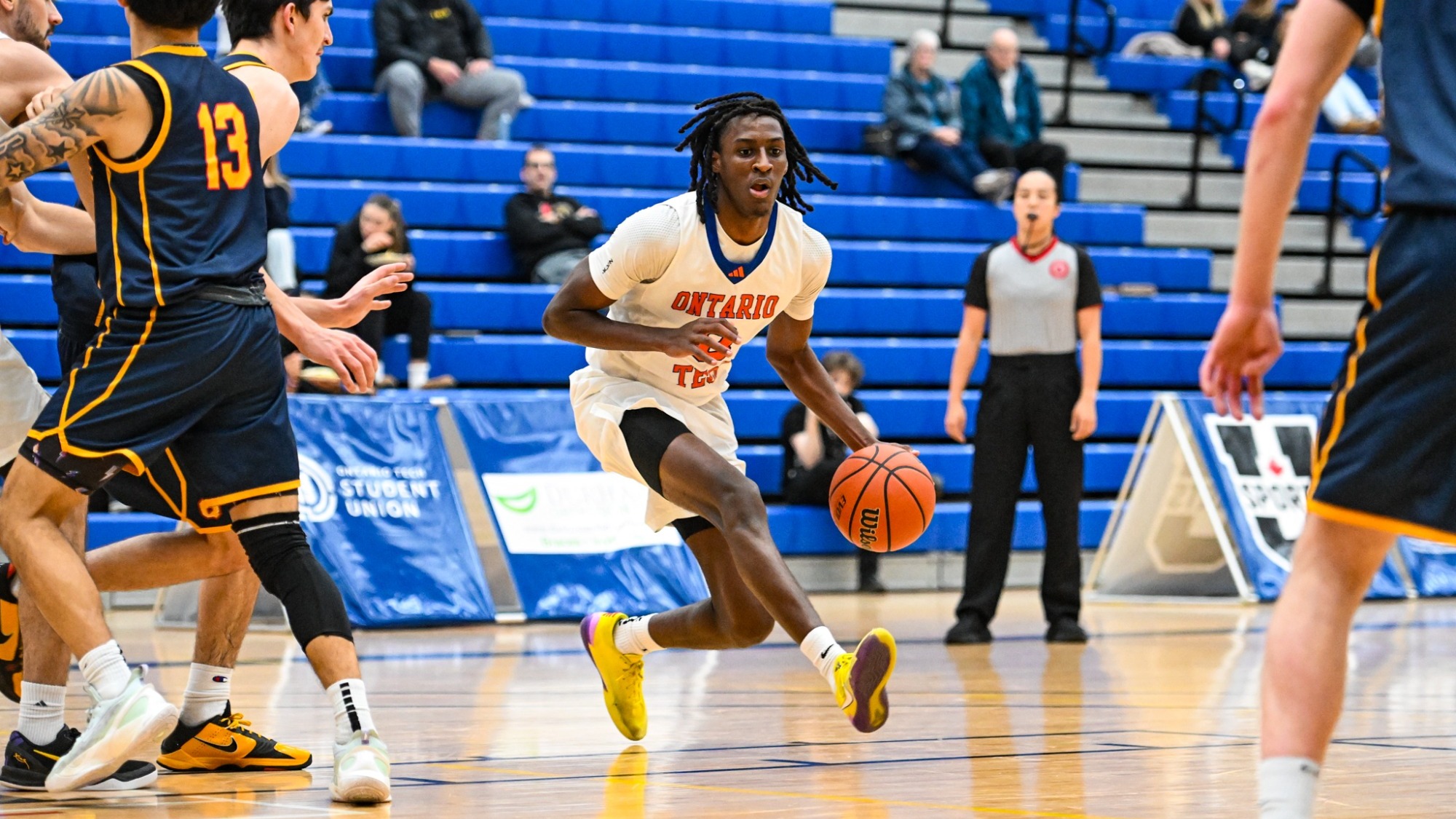 TJ Richards driving to the hoop