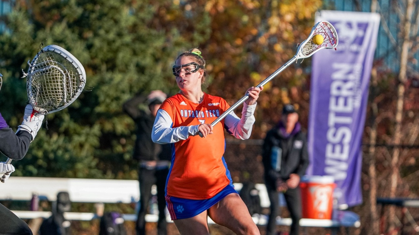 Olivia Toll shooting a ball