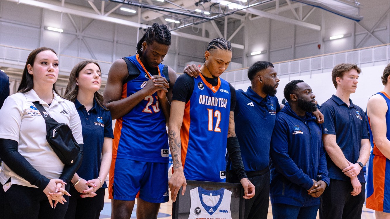 Ridgebacks before the game standing for the national athem 