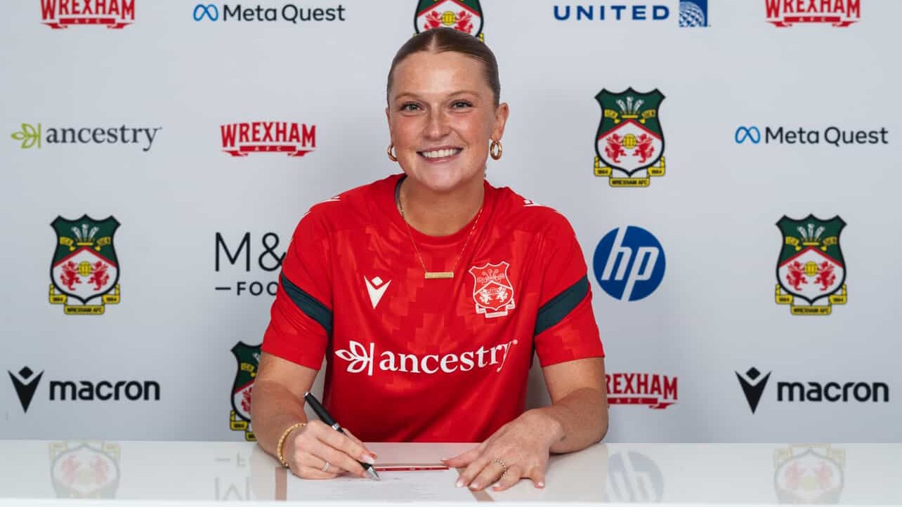 Sarah Harvey signing with Wrexham AFC