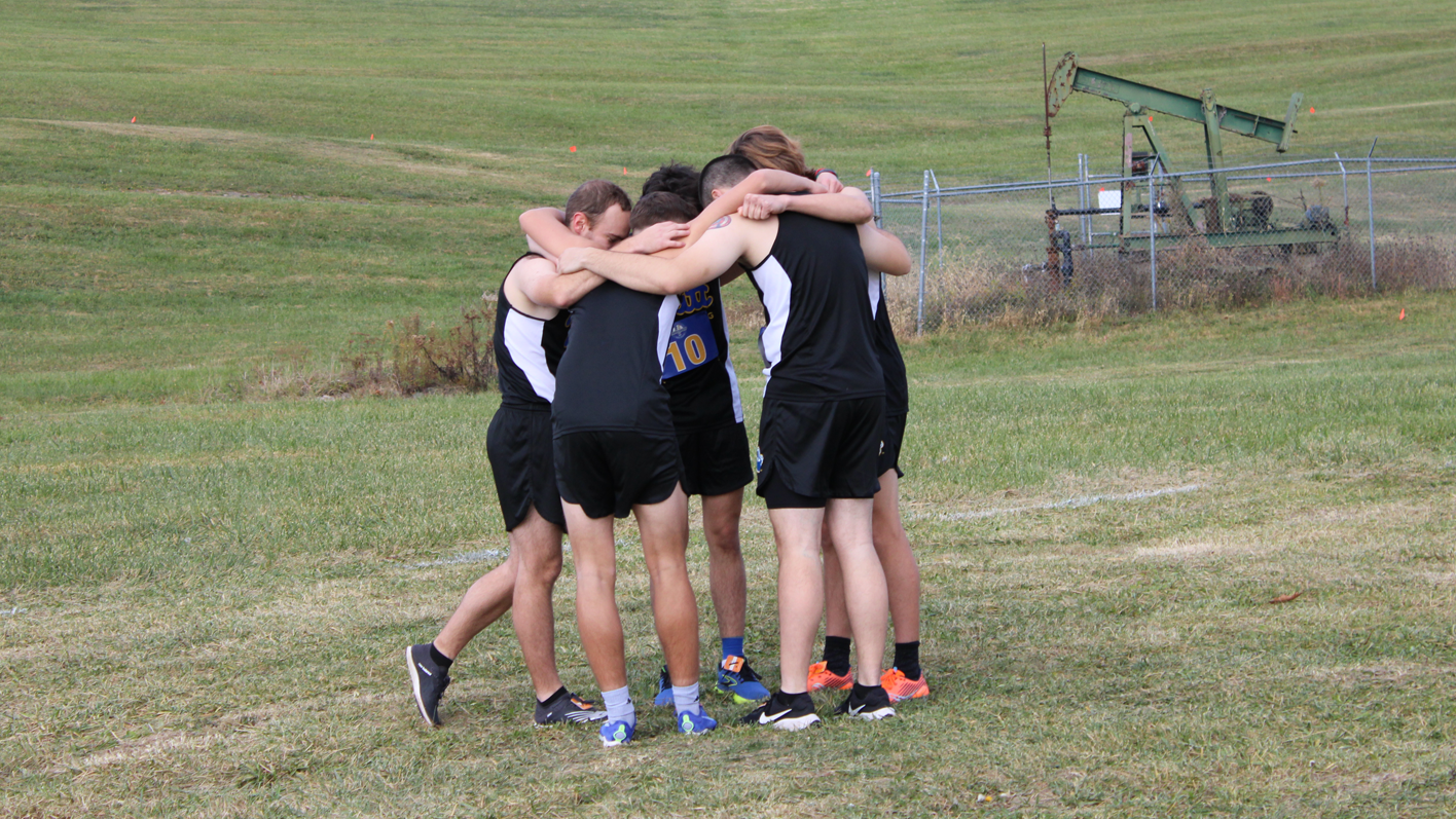 WOMEN'S XC TEAM HUDDLE