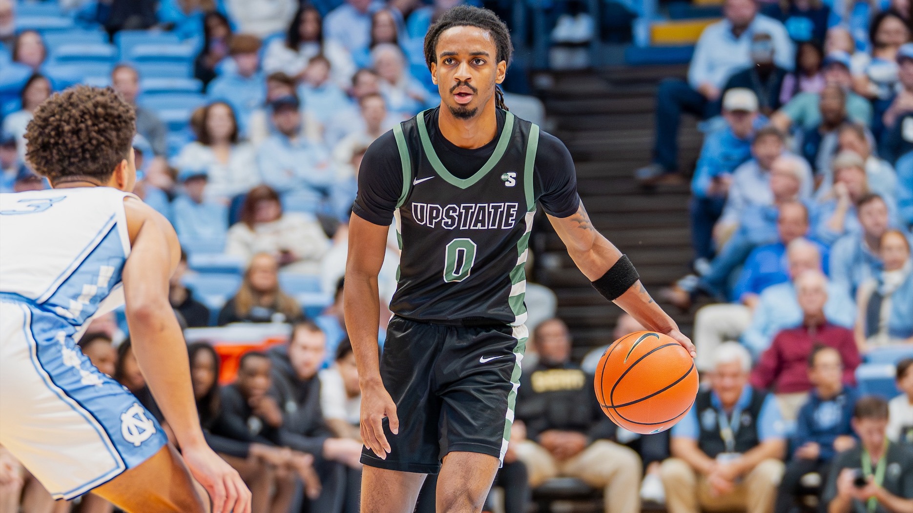 Tyler Smith dribbling against UNC (12/13/25)