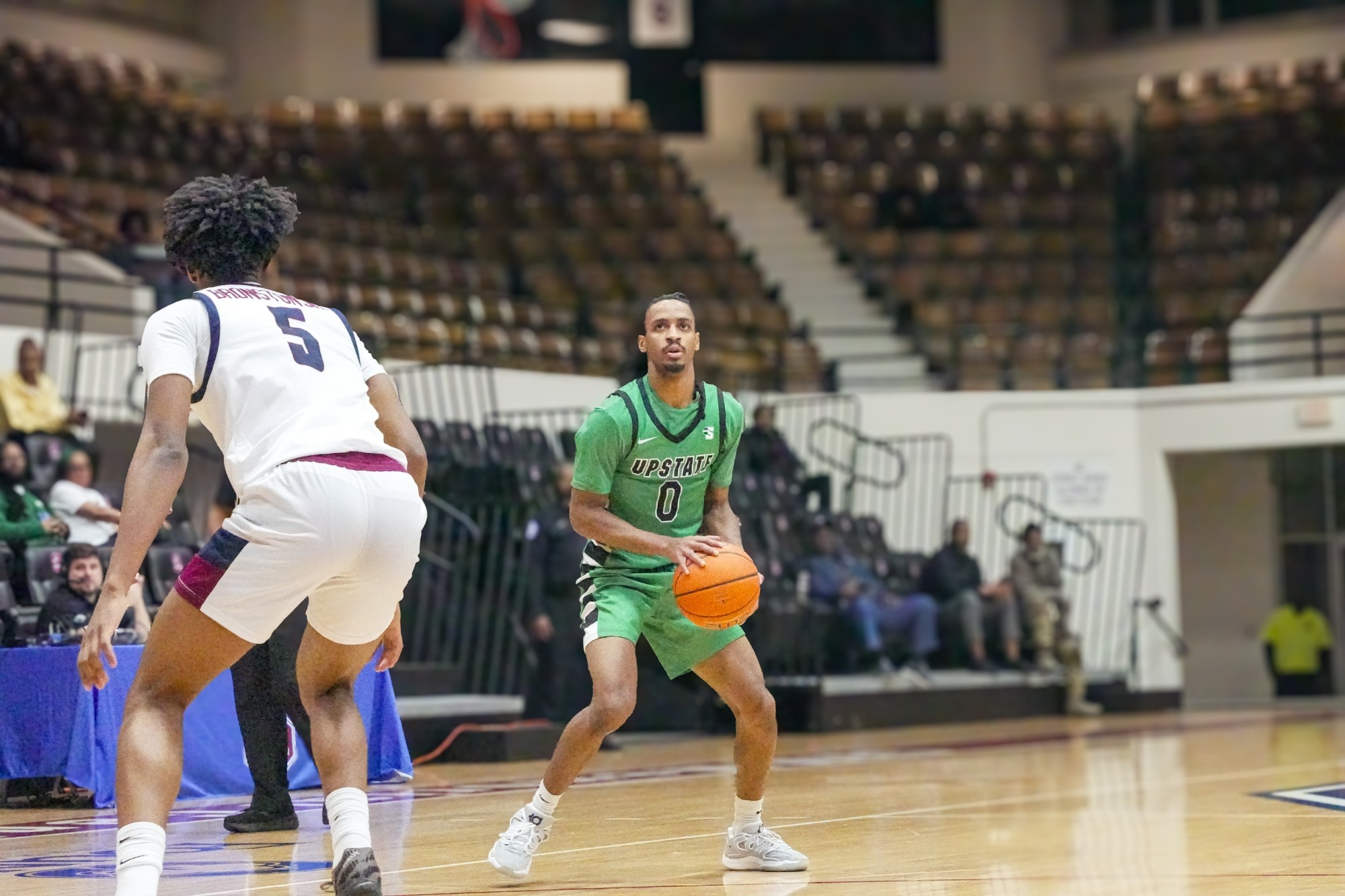 Tyler Smith going for the stepback three-pointer