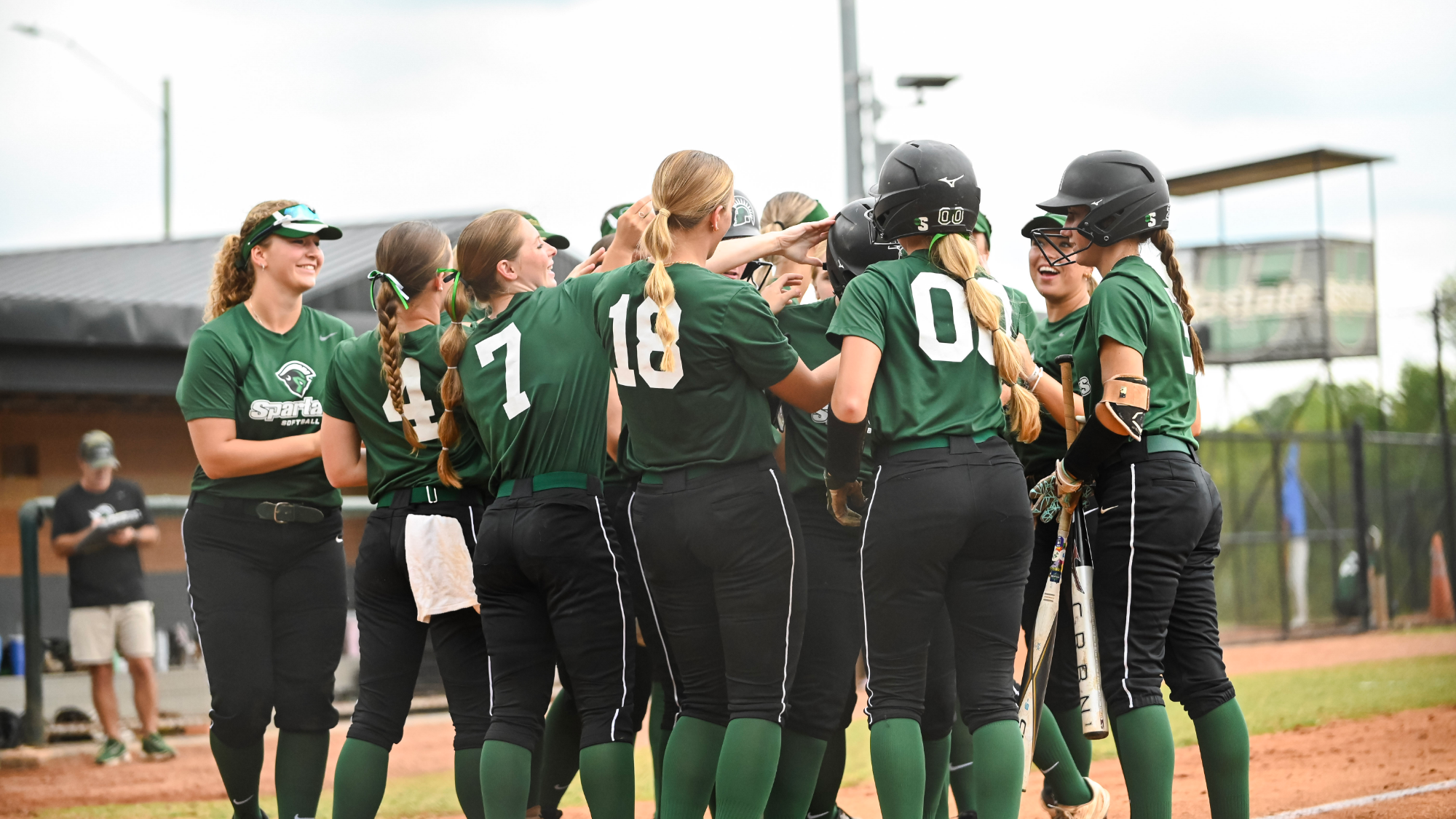 Upstate Softball after a homerun in fall ball