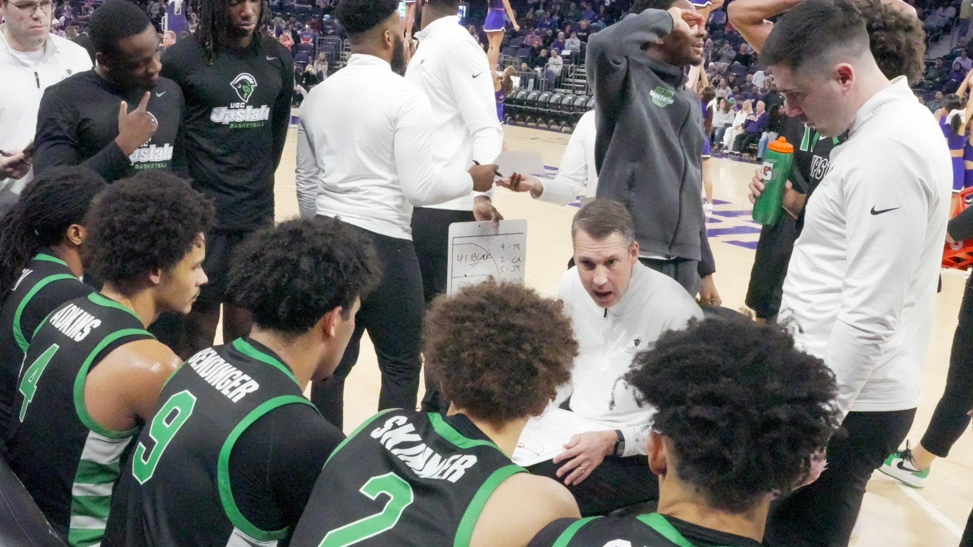 Marty Richter talking to his team during a media timeout vs. High Point (1/17/25)