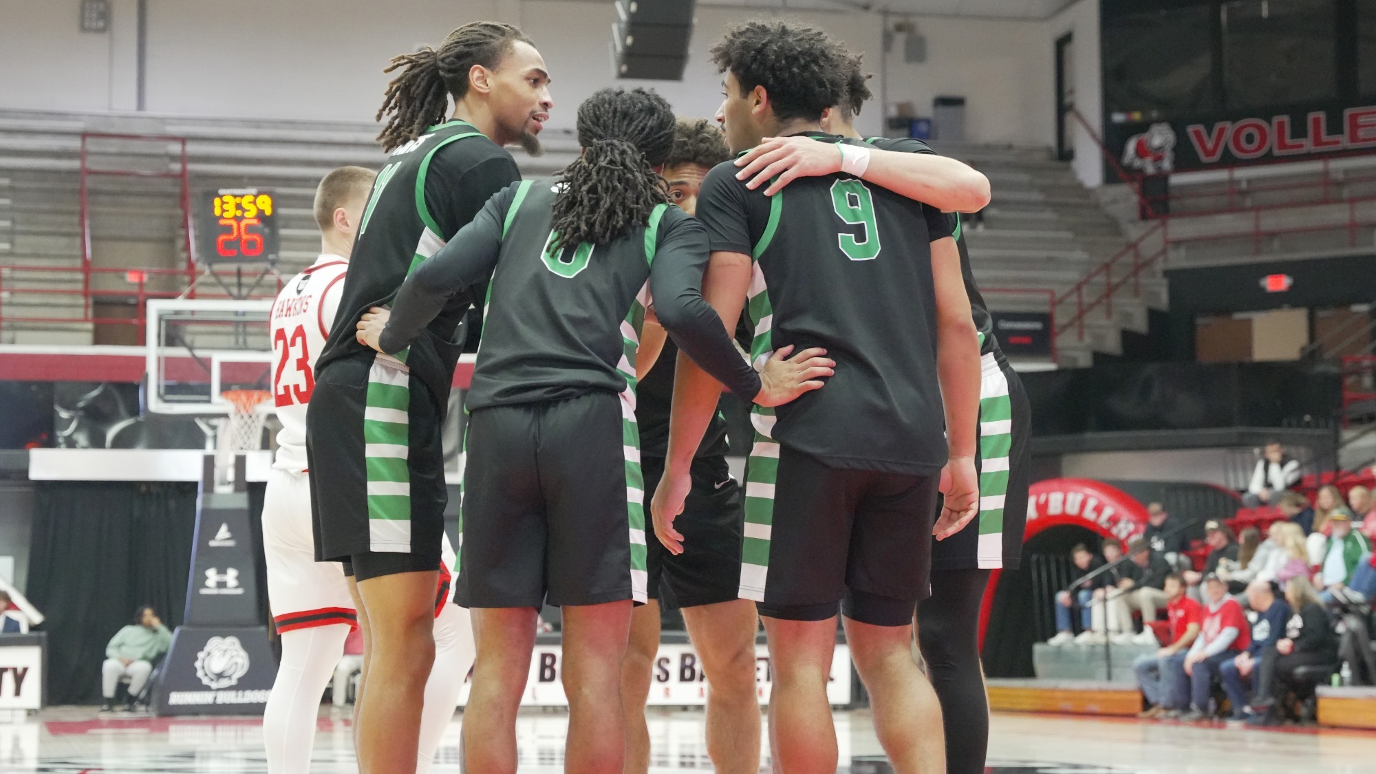Men's Basketball huddle at Gardner-Webb (1/23/25)