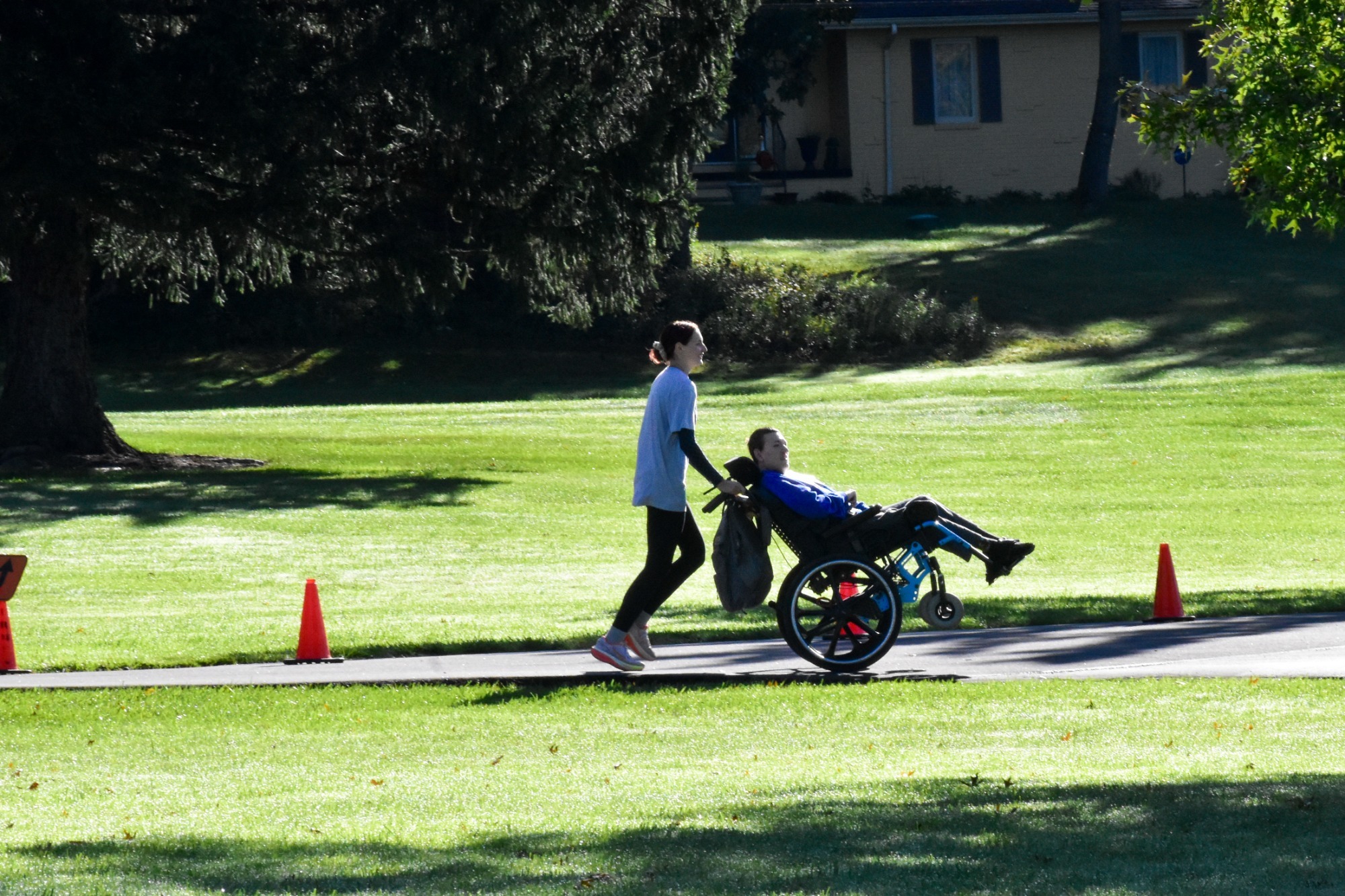 Kayla Kephart Running and Pushing Brother Greg