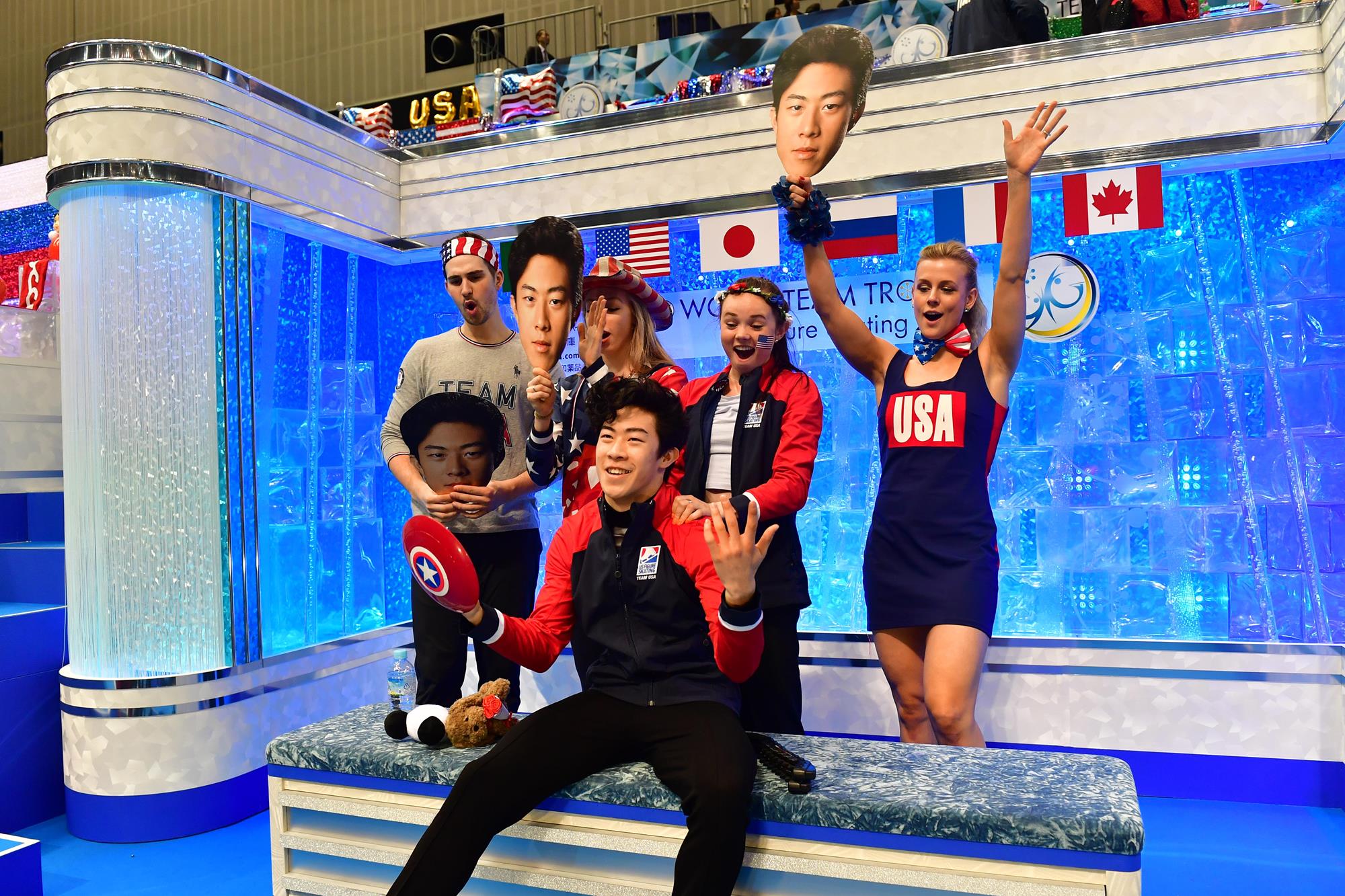 Nathan Chen of the United States celebrates after his score was announced at the kiss and cry with his team matesafter competing in the Men's Single Free Skating on day two of the ISU Team Trophy at Marine Messe Fukuoka on April 12, 2019 in Fukuoka, Japan. (Photo by Atsushi Tomura - International Skating Union (ISU)/ISU via Getty Images)