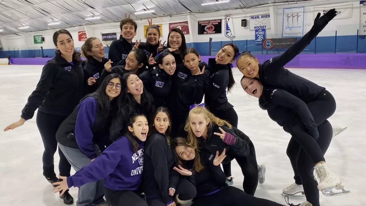 The NYU Figure Skating poses for a funny on-ice photo. 