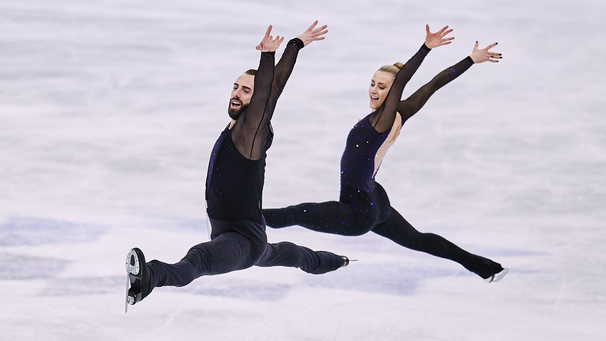 Cain-Gribble and LeDuc leap during short program at the 2021 World Championships