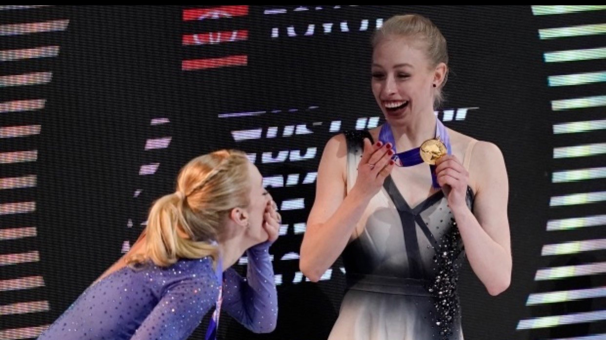 Amber Glenn and Bradie Tennell laugh together after getting their medals at the 2021 Toyota U.S. Figure Skating Championships