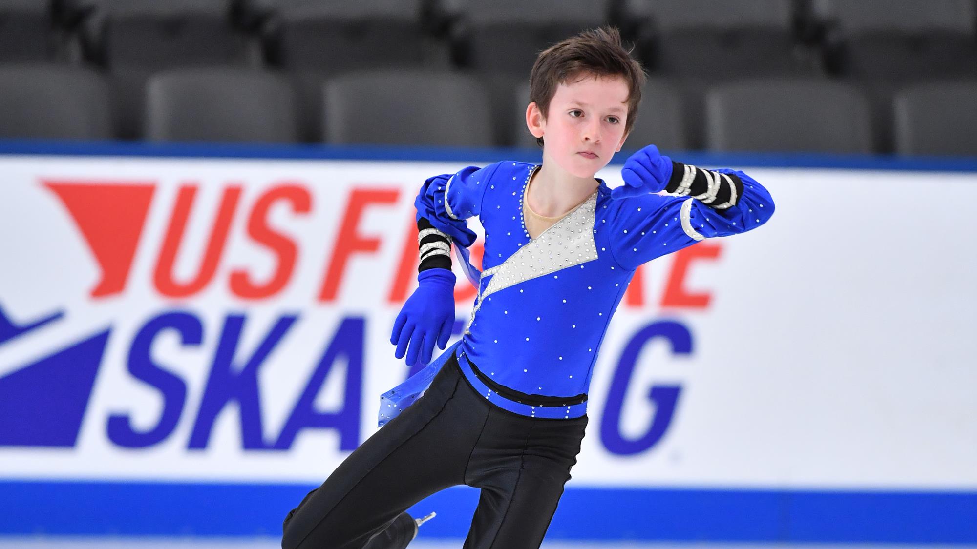 Aleksandr Fegan skates in men short program at U.S. Challenge Skate. 