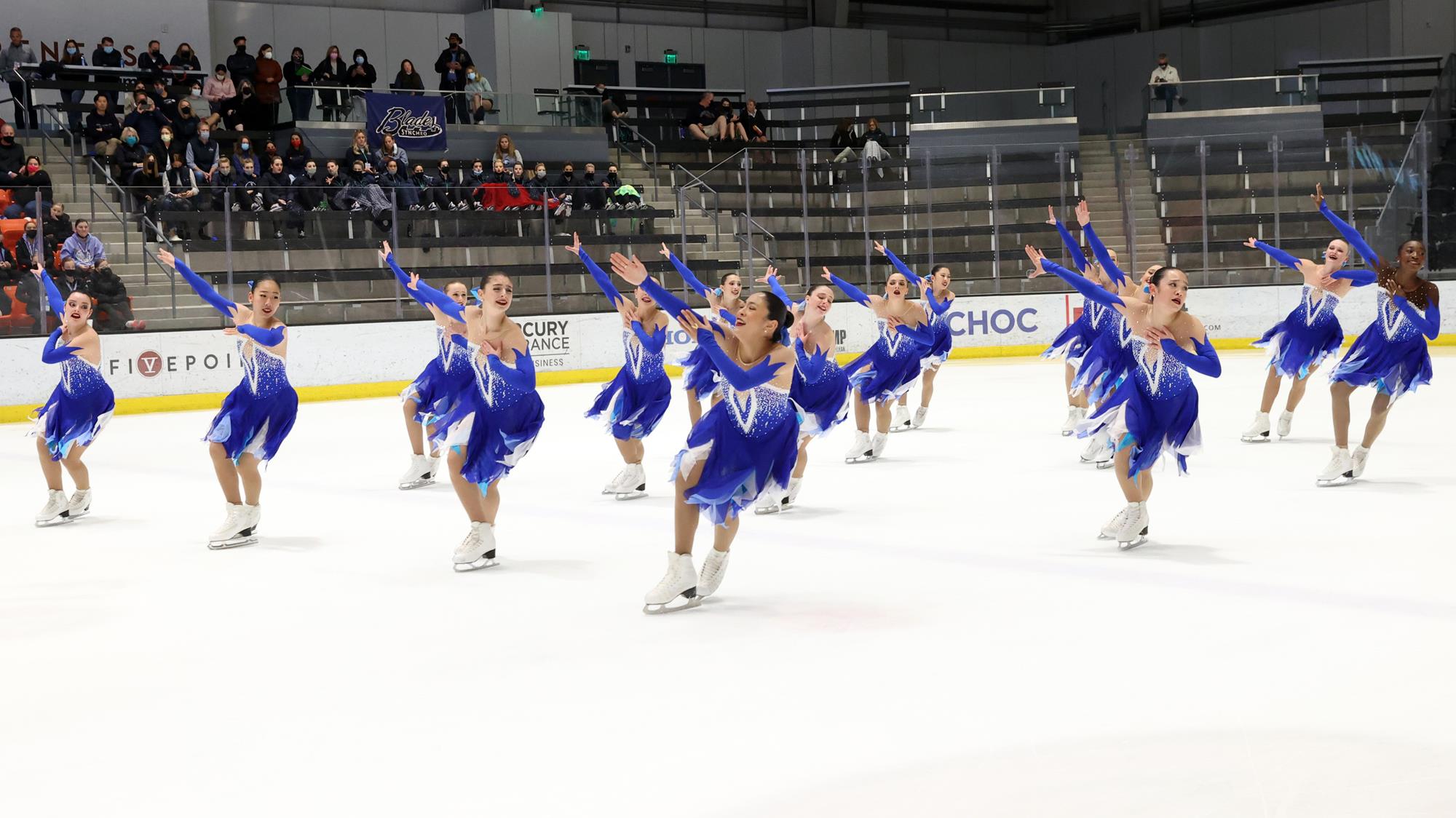 Team Image performs in blue dresses