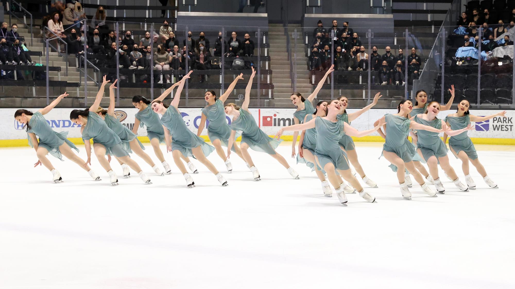 The Lexettes perform in green dresses