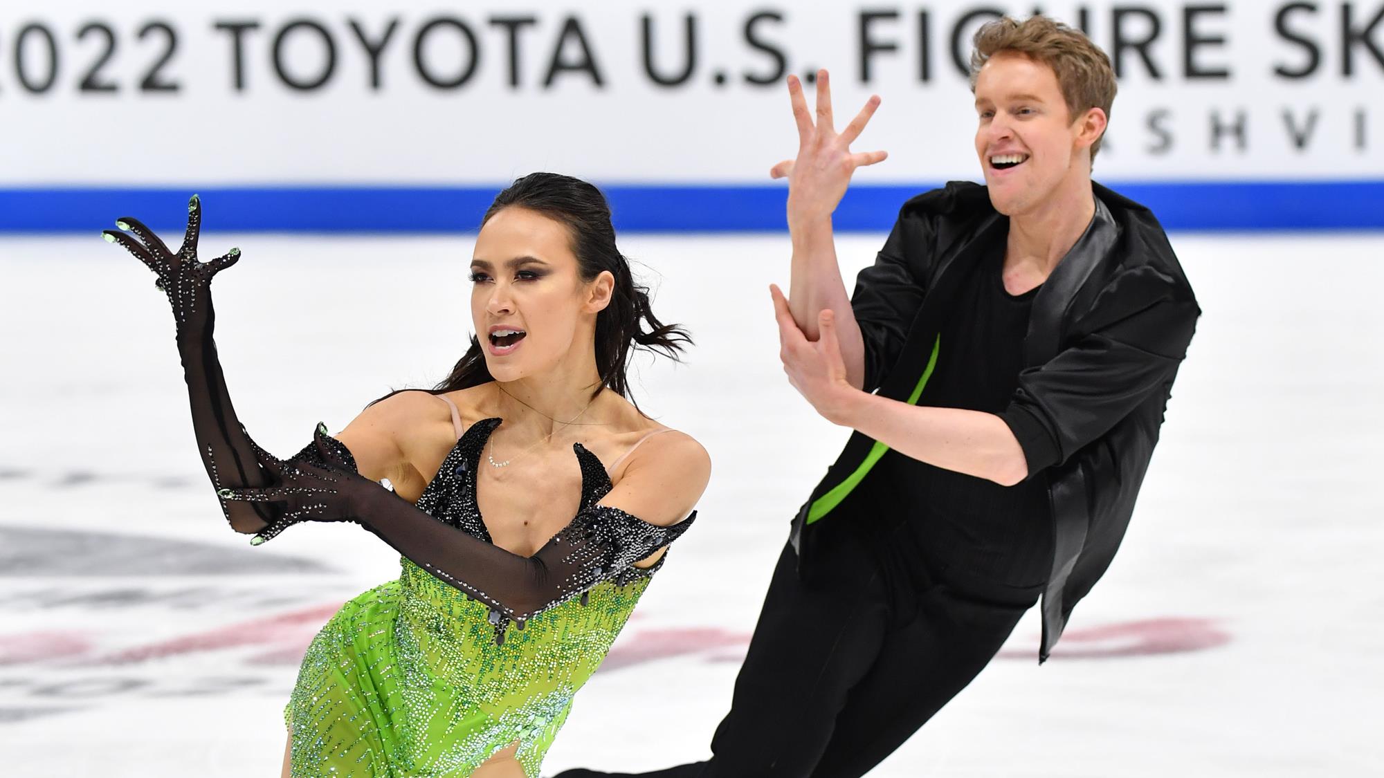 Madison Chock and Evan Bates perform their rhythm dance in green and black costumes at 2022 U.S. Championships