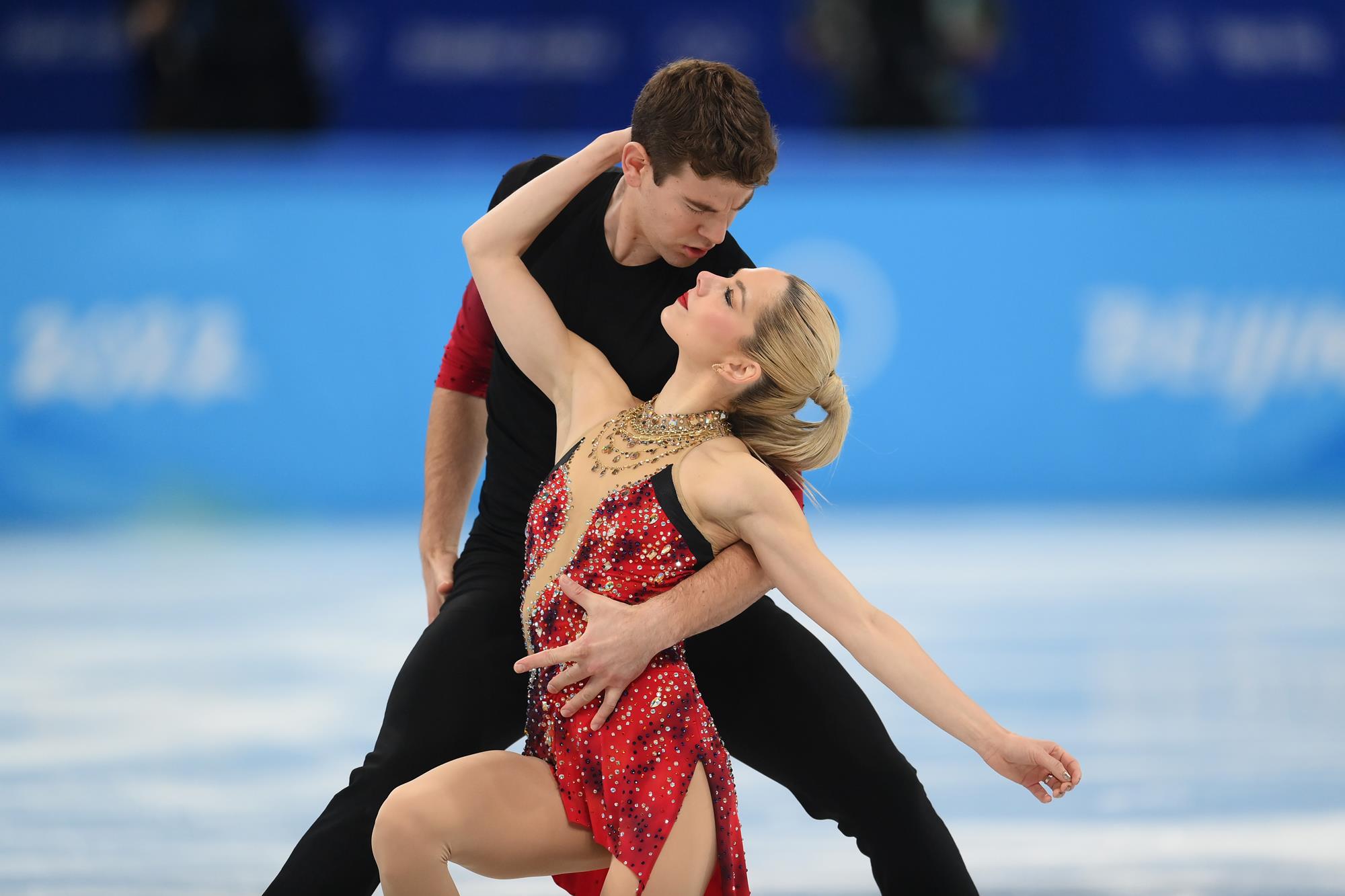 Alexa Knierim and Brandon Frazier look into each other's eyes during the short program.