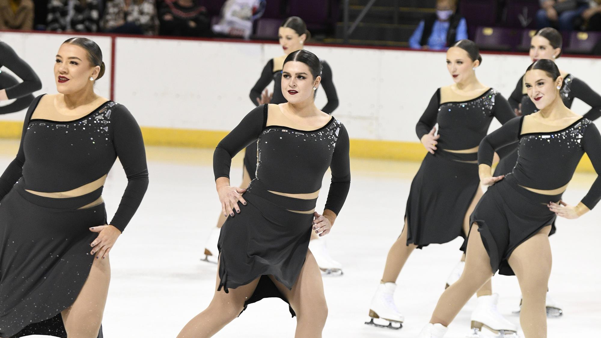 Miami University performs their free skate in black dresses at the 2022 U.S. Synchronized Championships