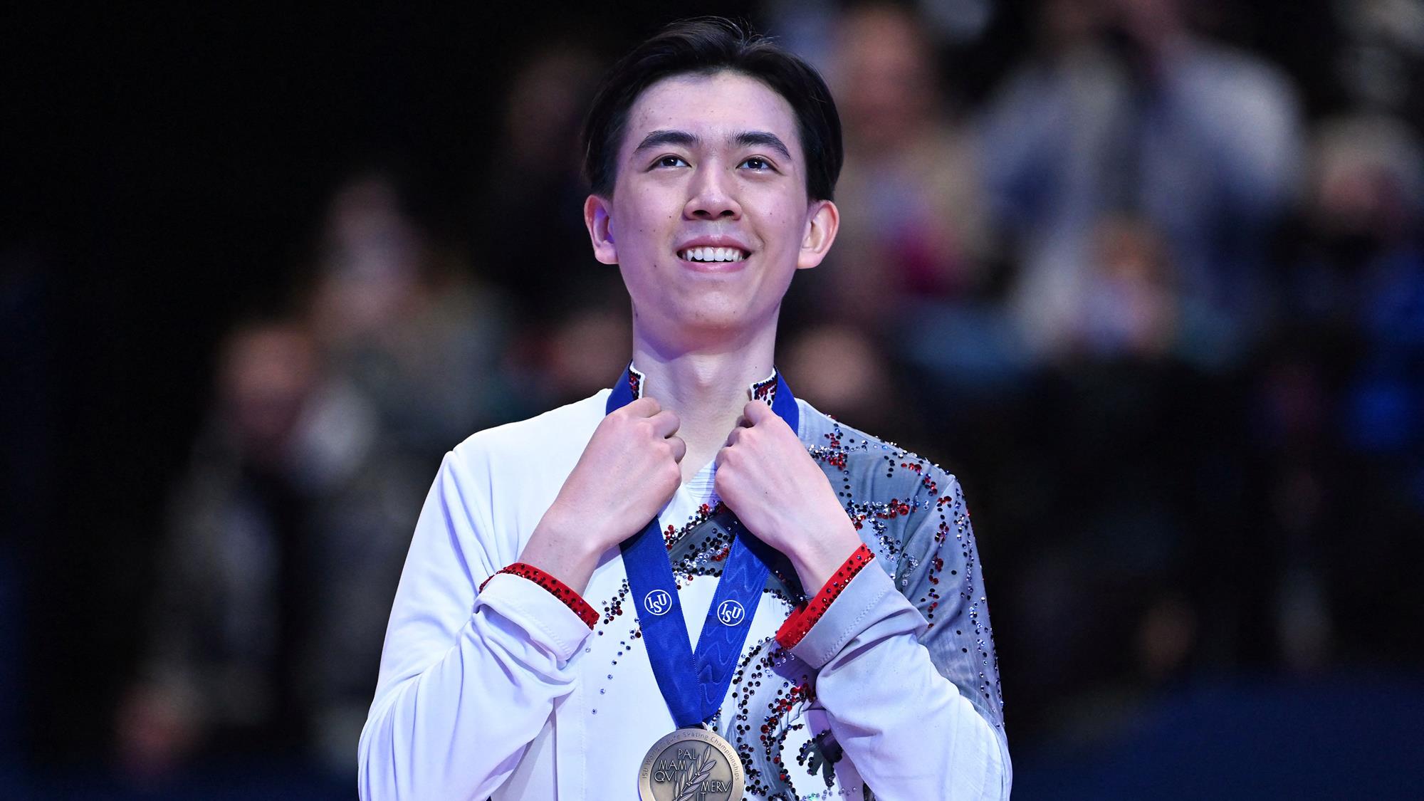 Vincent Zhou poses proudly with his World bronze medal at the 2022 event