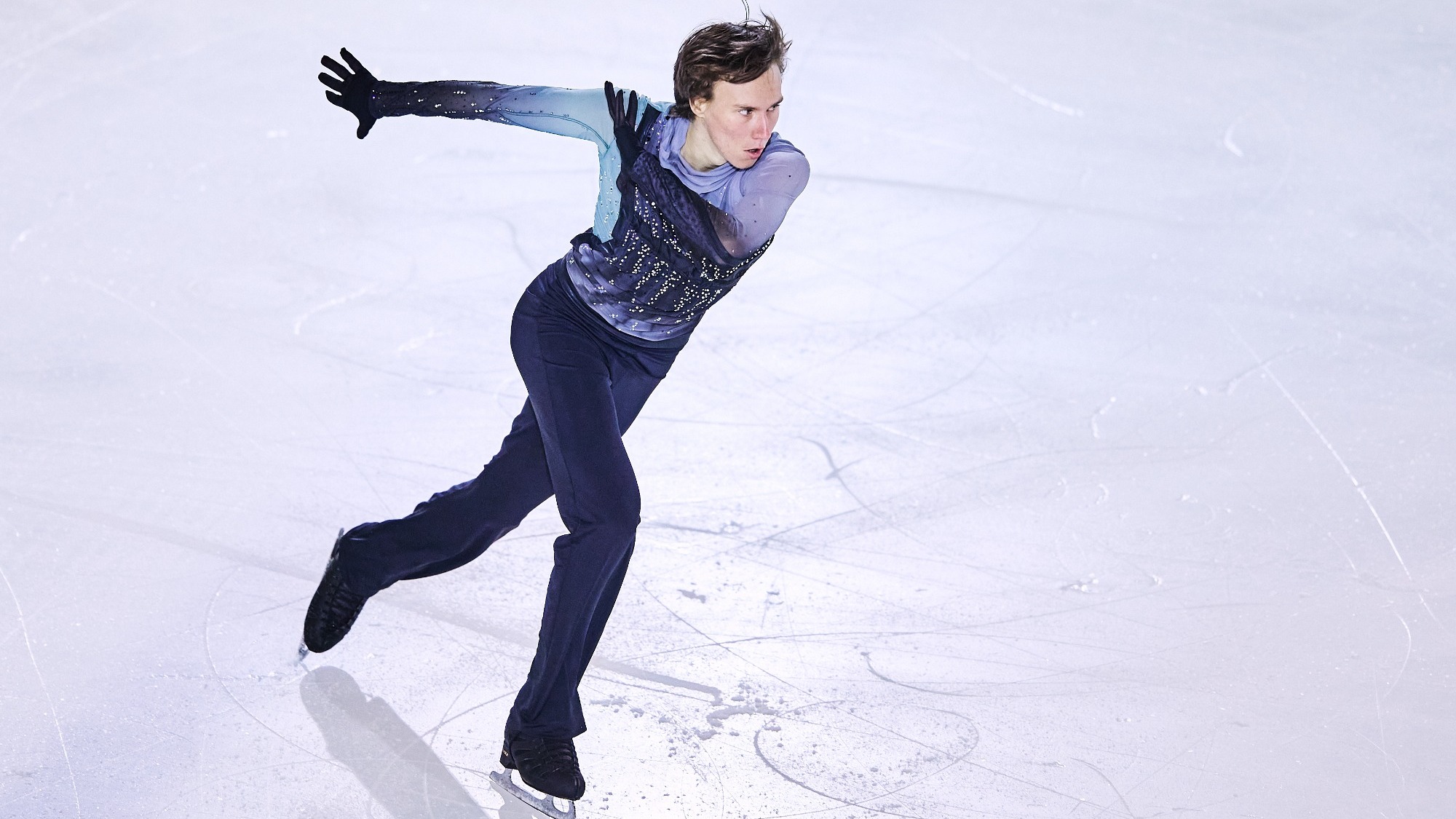 Daniel Martynov skates intensely at the Junior Grand Prix in Egna.
