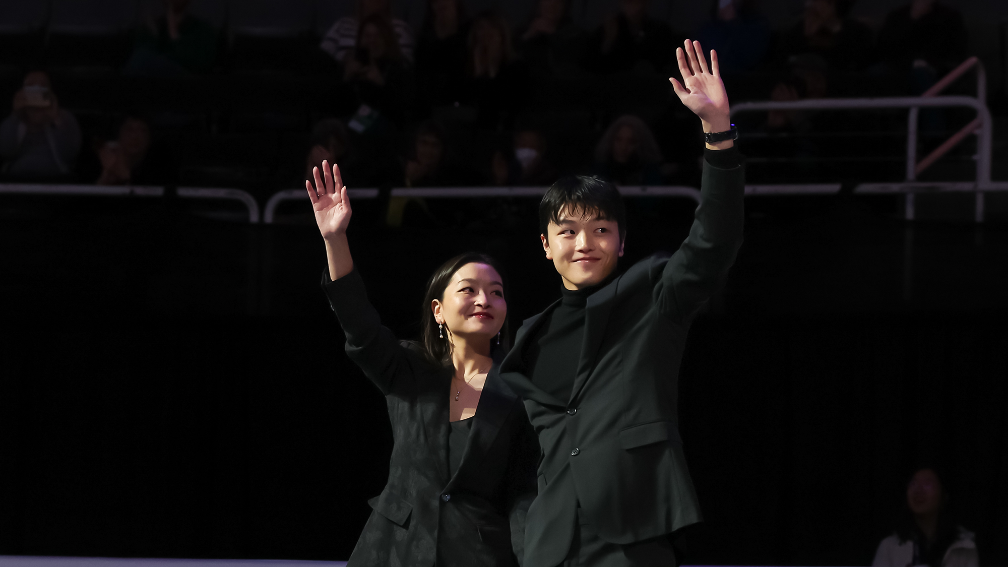 Maia Shibutani and Alex Shibutani wave to the crowd during the Hall of Fame ceremony at the 2023 Toyota U.S. Figure Skating Championships.