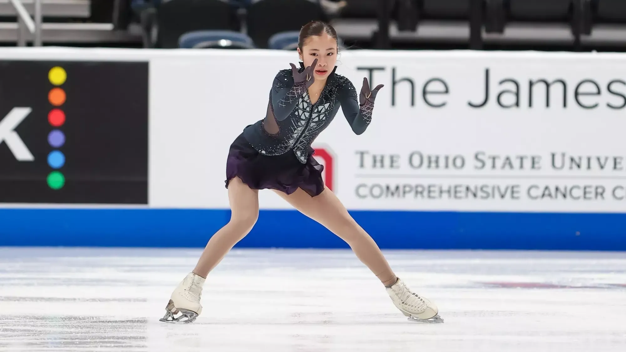 Dressed in black and gray, Logan Higase-Chen displays her quality presence at center ice. 