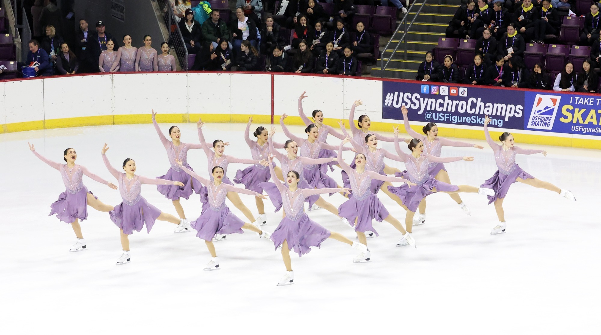 Wearing subtle light purple, the Skyliners junior team performs its emotinal short program.