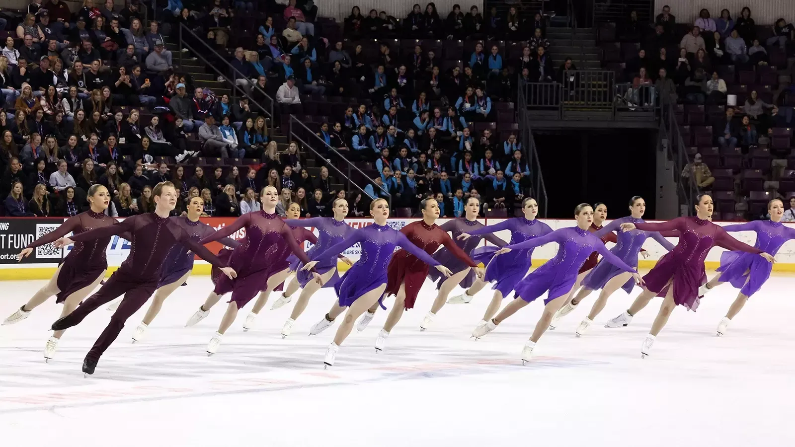 Dressed in purple and red, they Haydenettes show their speed and unison in their line element.