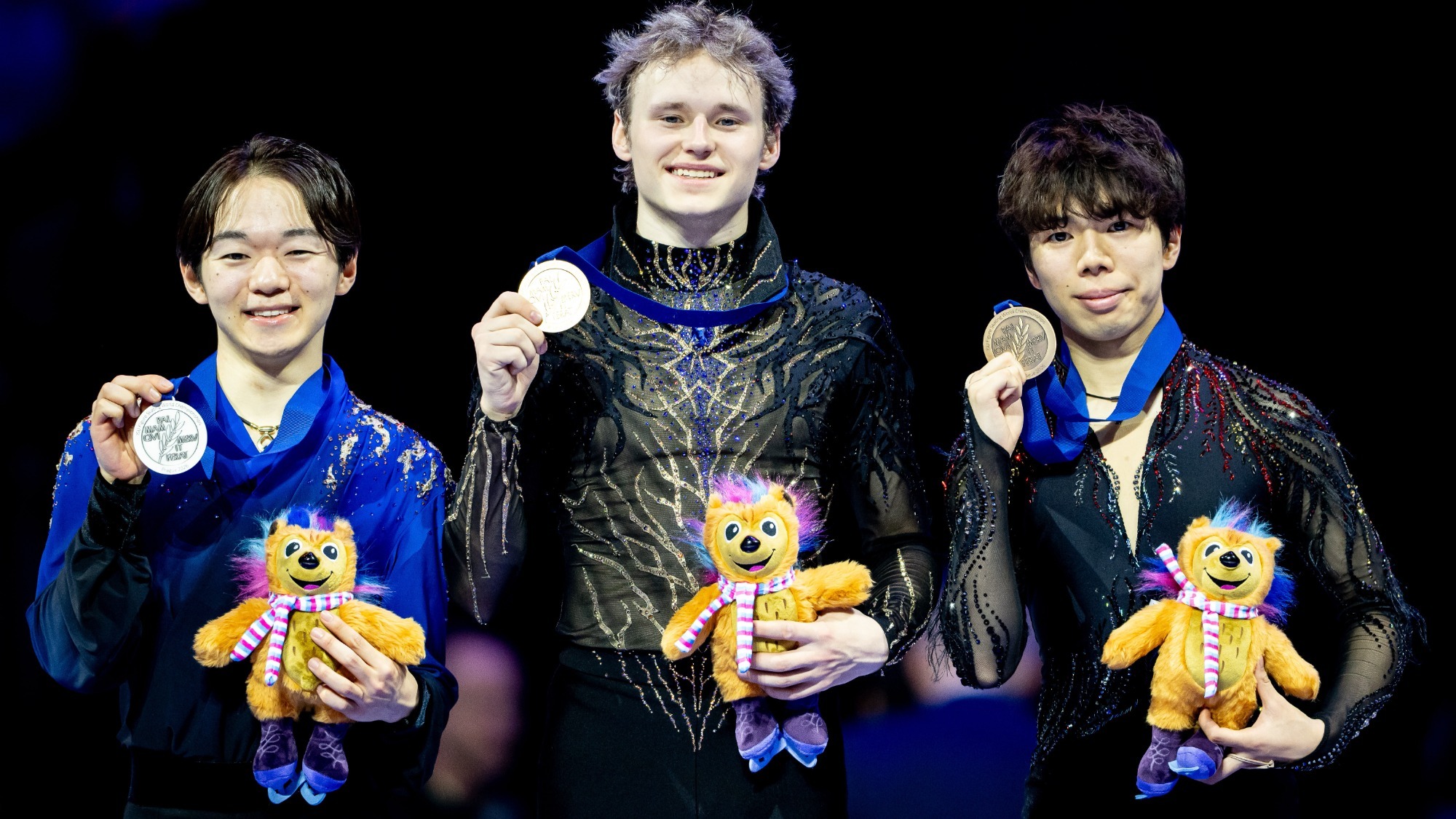 Ilia Malinin shares the 2026 World podium with fellow medalists Yuma Kagiyama and Shun Sato.