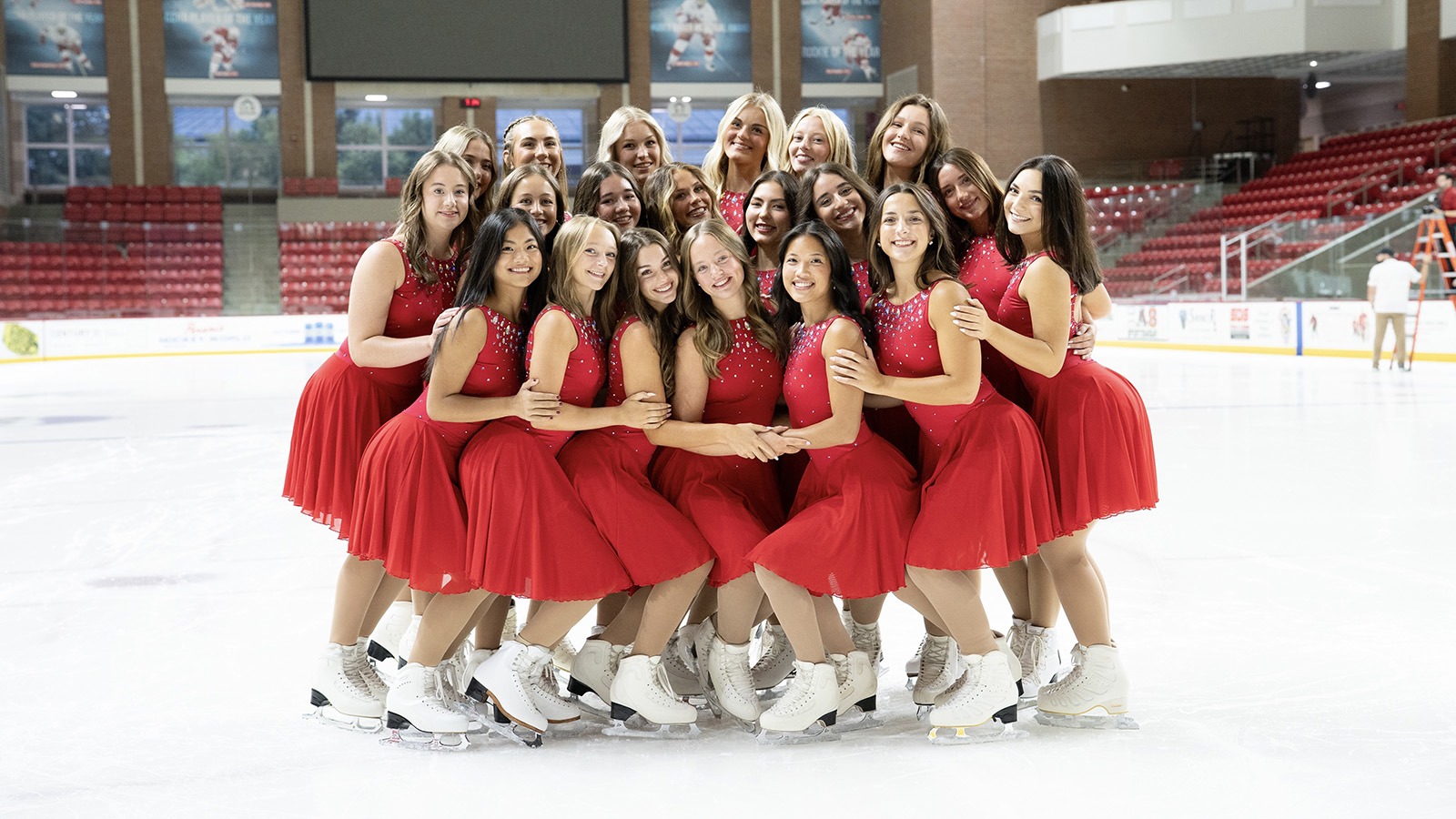 Dressed in red, the entire Miami University RedHawks synchronized skating team