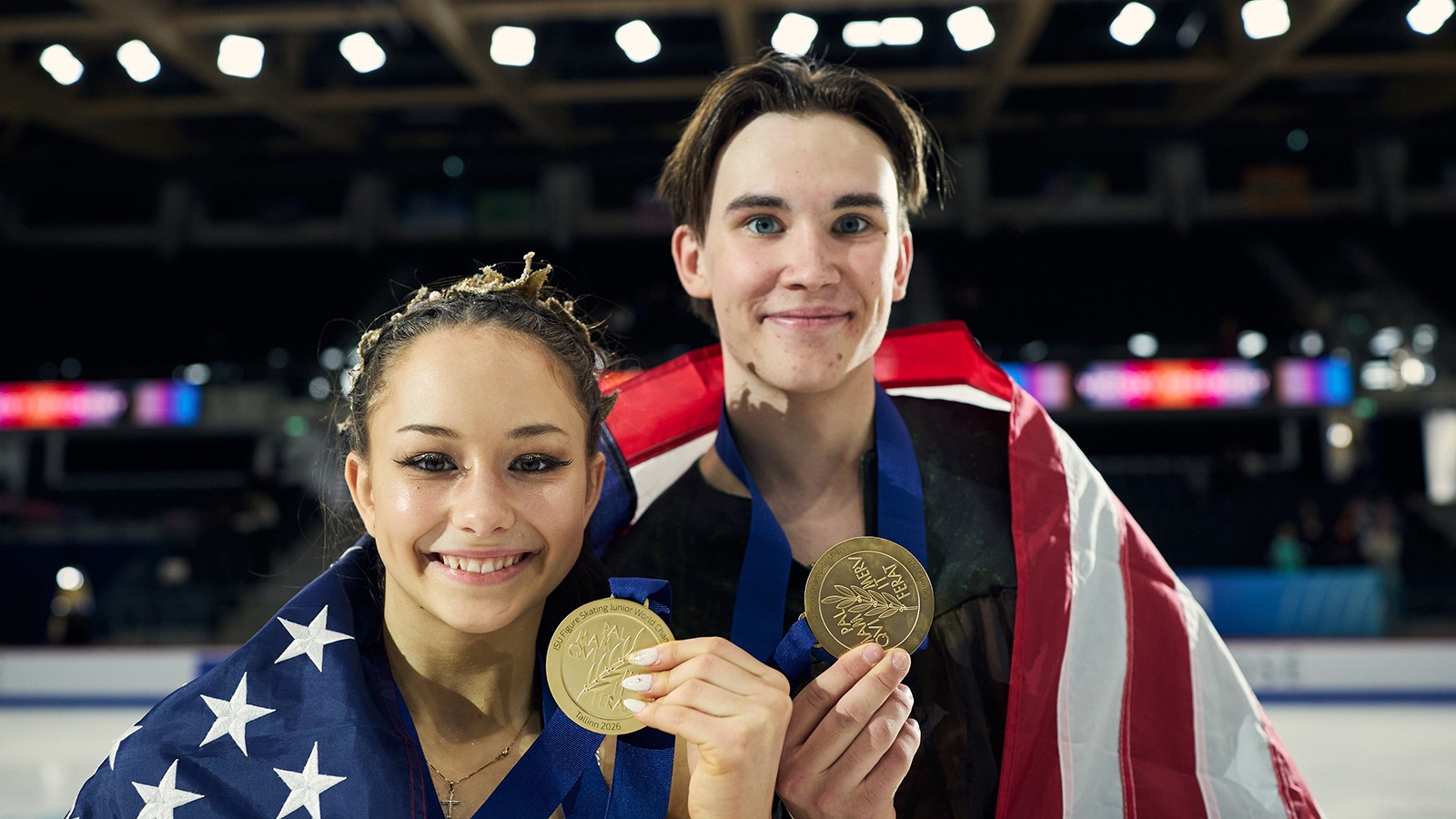 Holding their gold medals are Hana Maria Aboian and Daniil Veselukhin at Junior World Championships. 