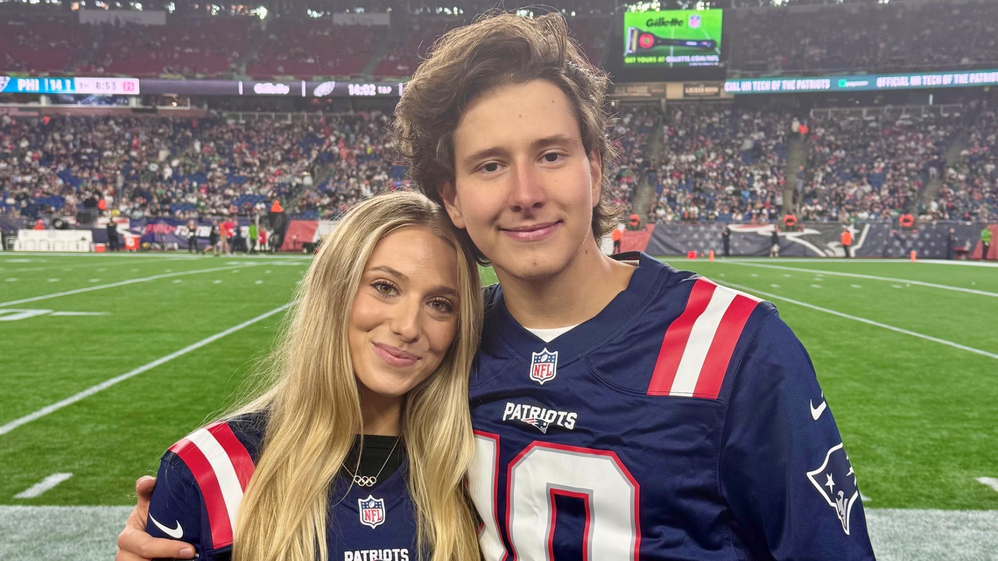 Emilea Zingas and Vadym Kolesnik attend a New England Patriots game this summer.