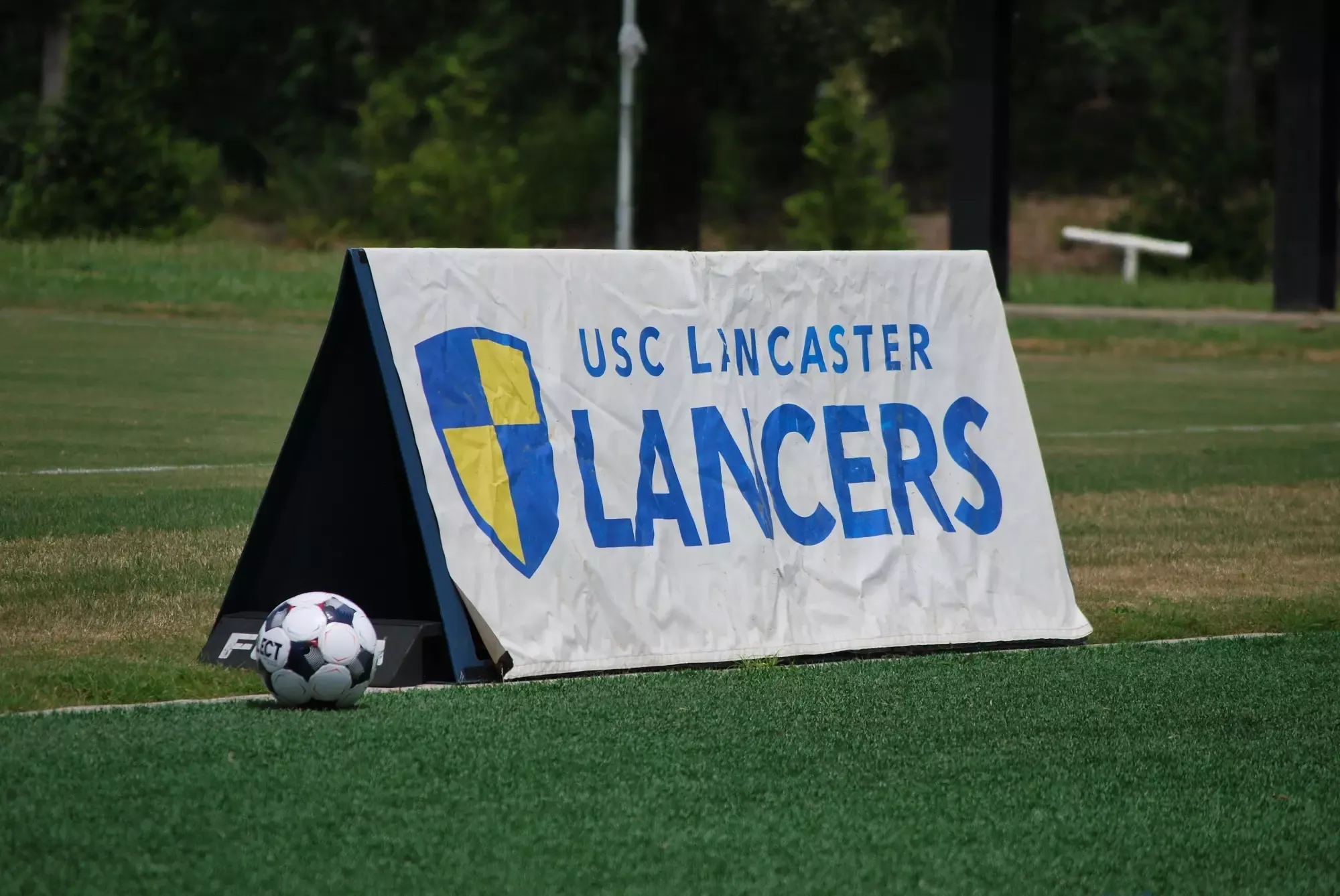 Lancer's Sign and Soccer Ball 