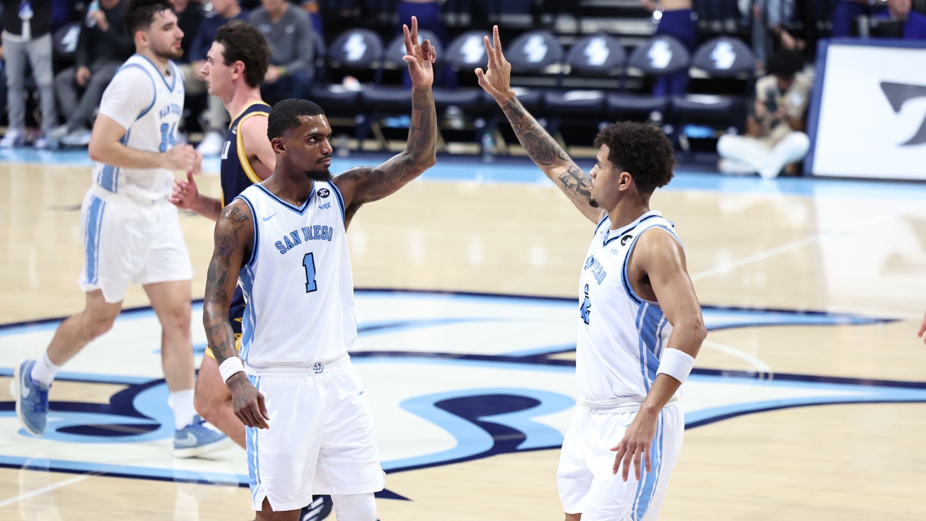 Toneari Lane, Adrian McIntyre 3-Point Celebration