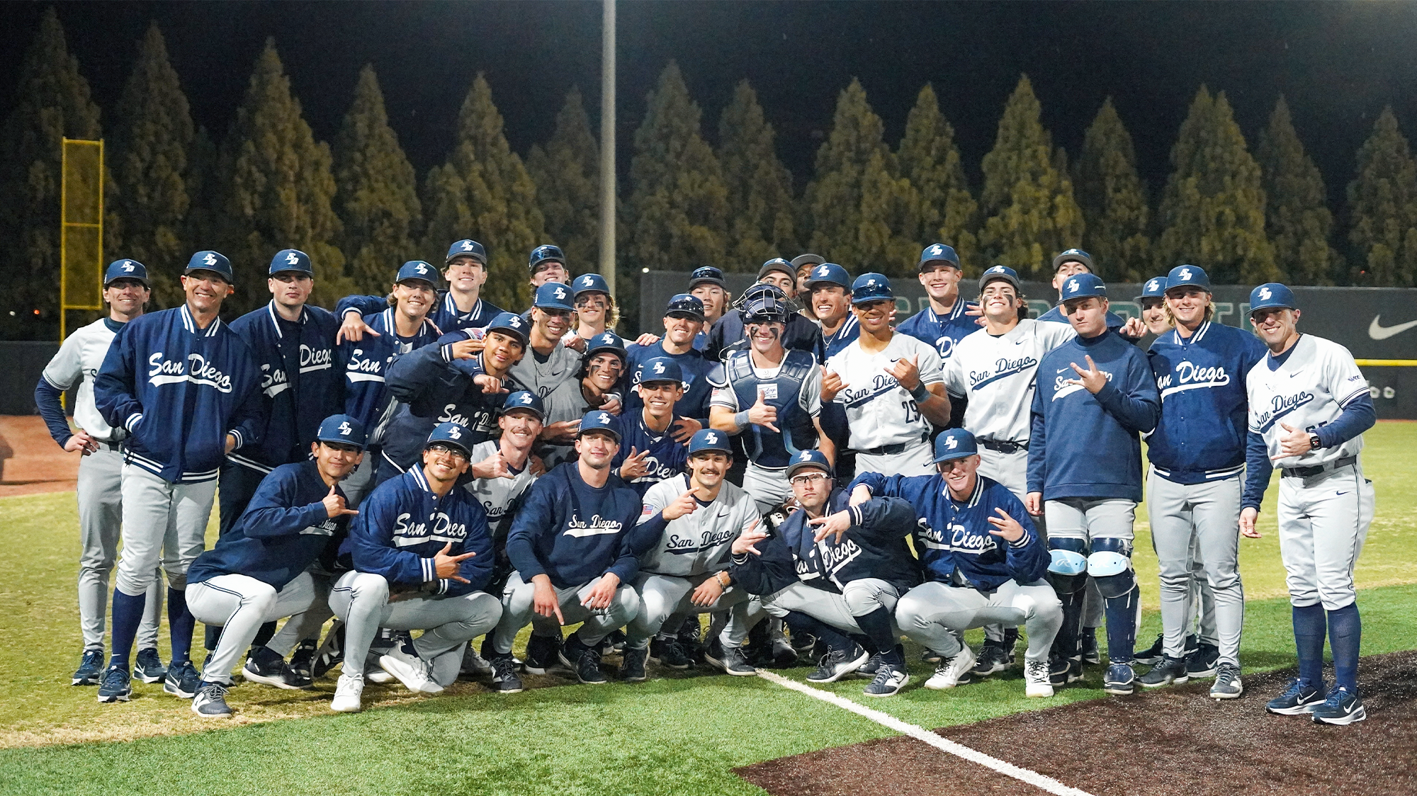 usd baseball celebrates win at charlotte 2_13_26 - credit anderson haigler
